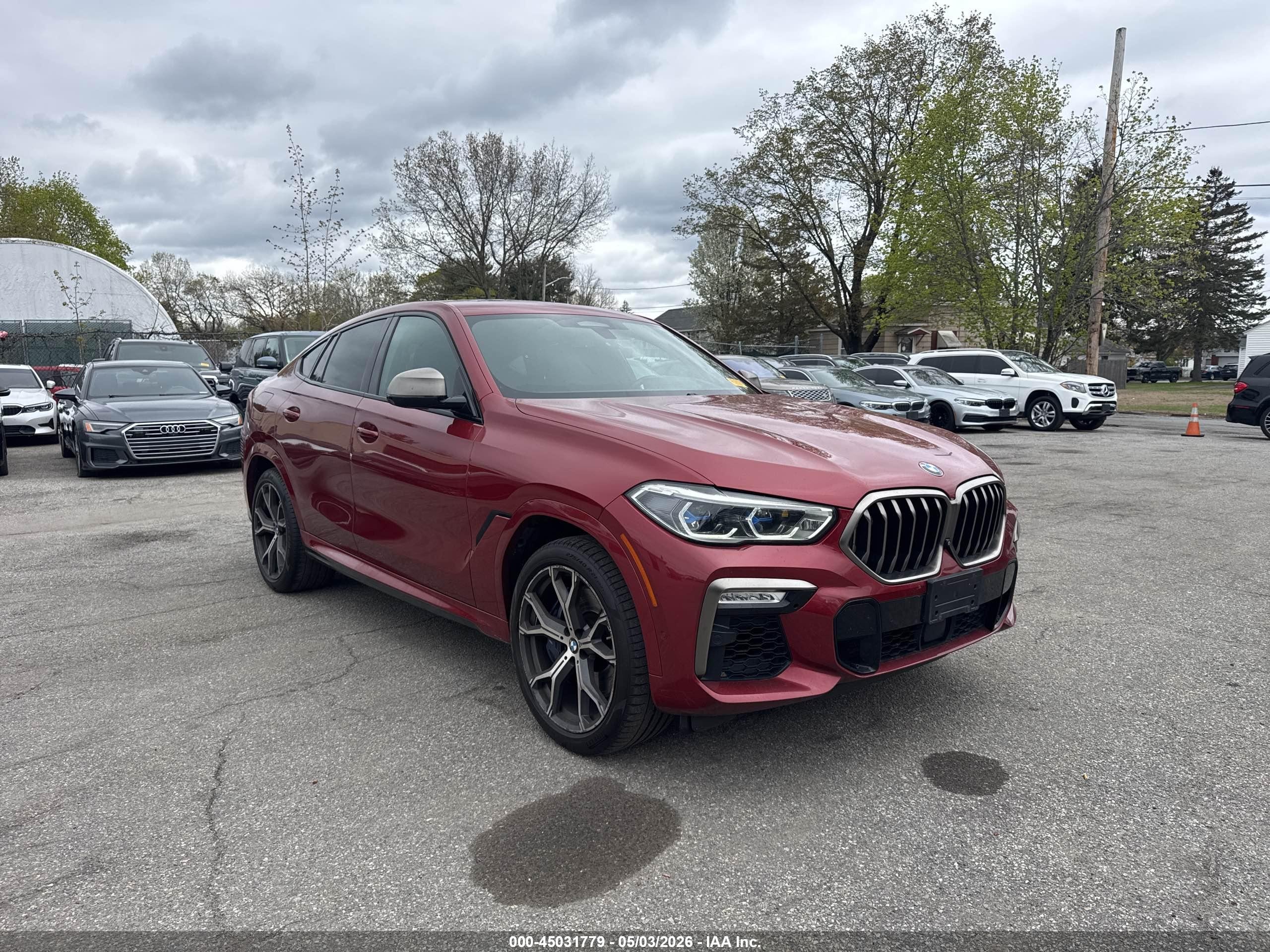 2021 BMW X6 M50i, VIN 5UXCY8C09M9E51267 — Auction photo