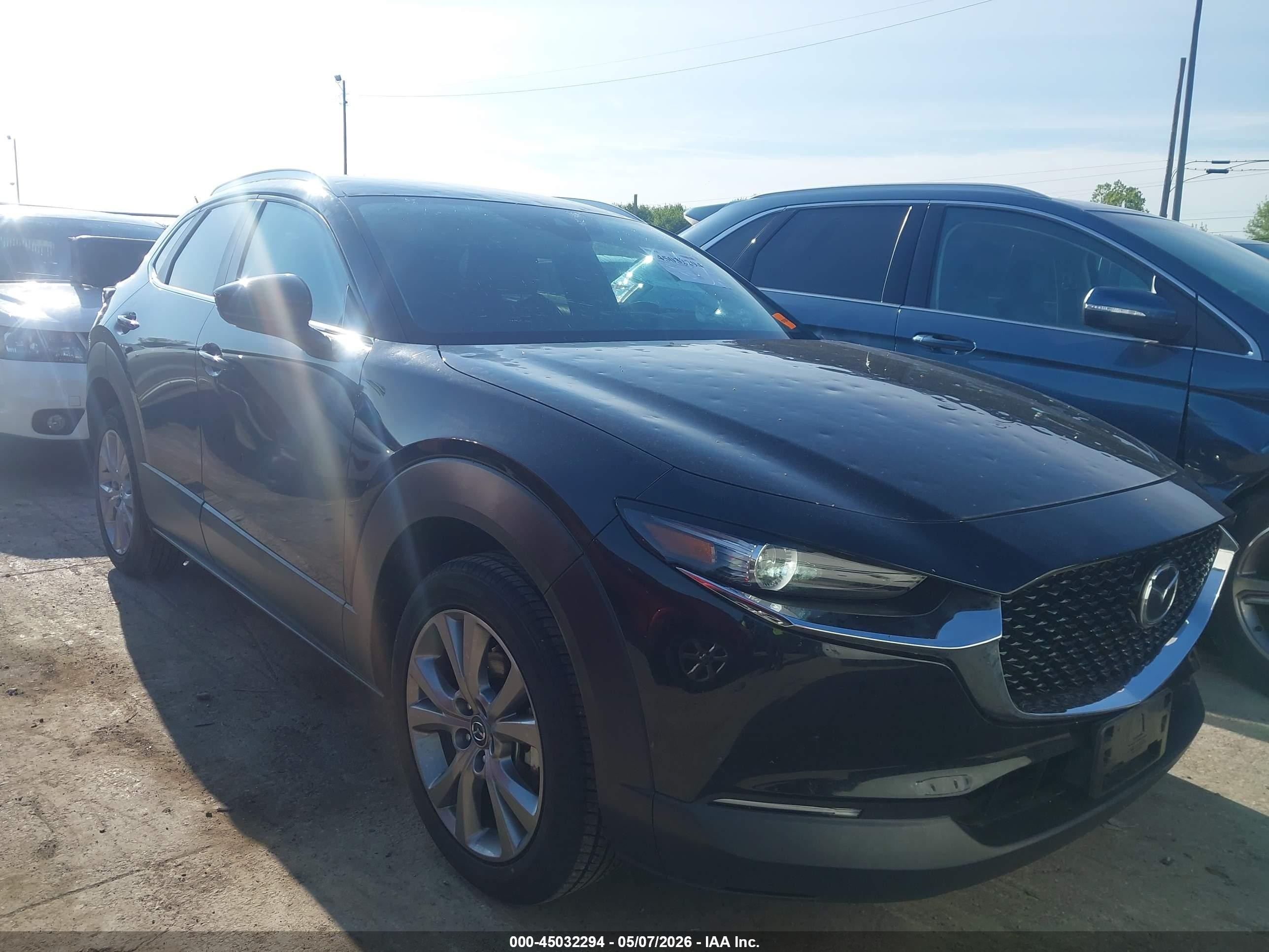 2023 Mazda CX-30 S Carbon Edition, VIN 3MVDMBCM8PM507802 — Hail