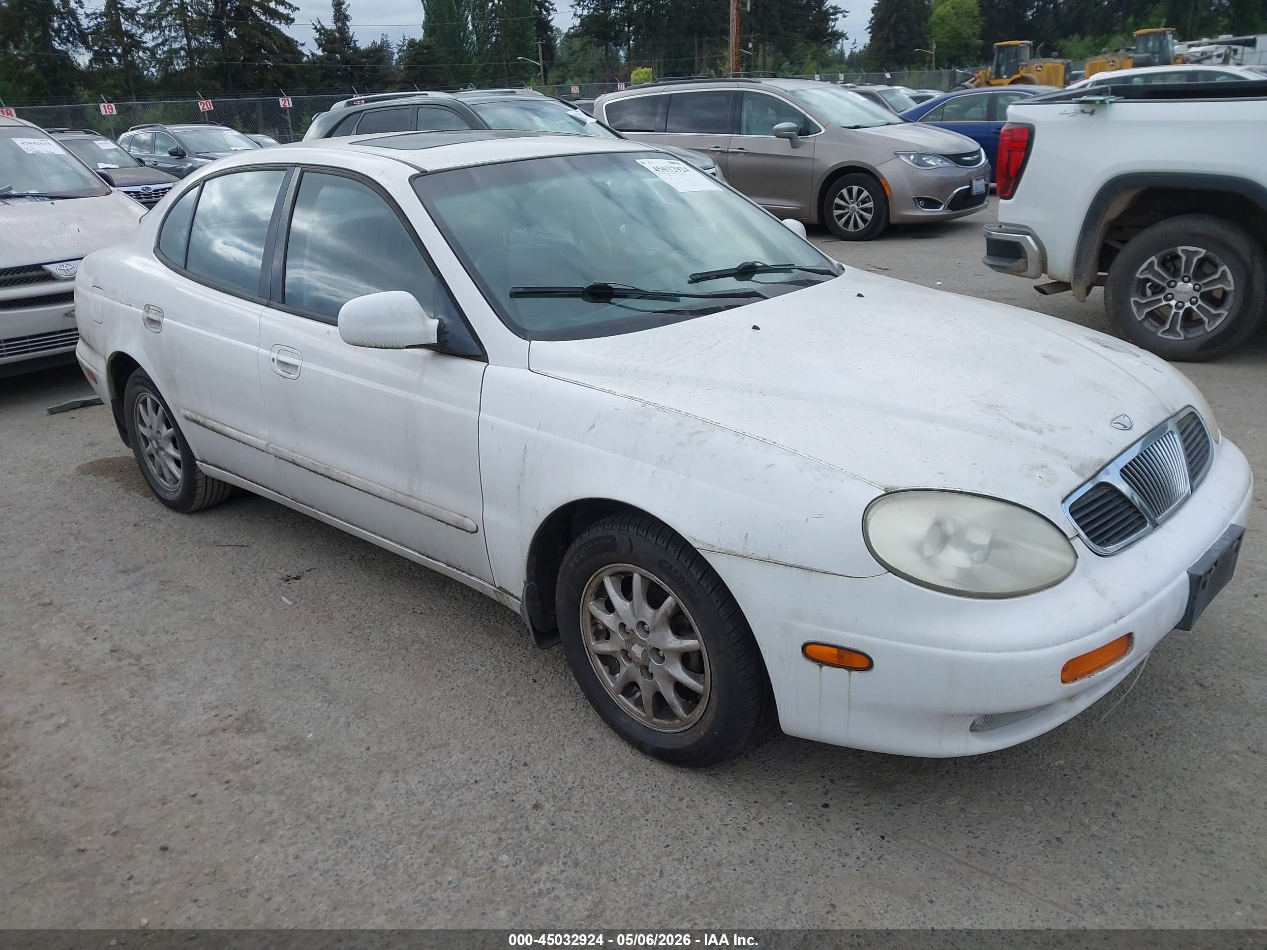 2001 Daewoo Leganza, VIN KLAVA69271B309018 — Обычный износ