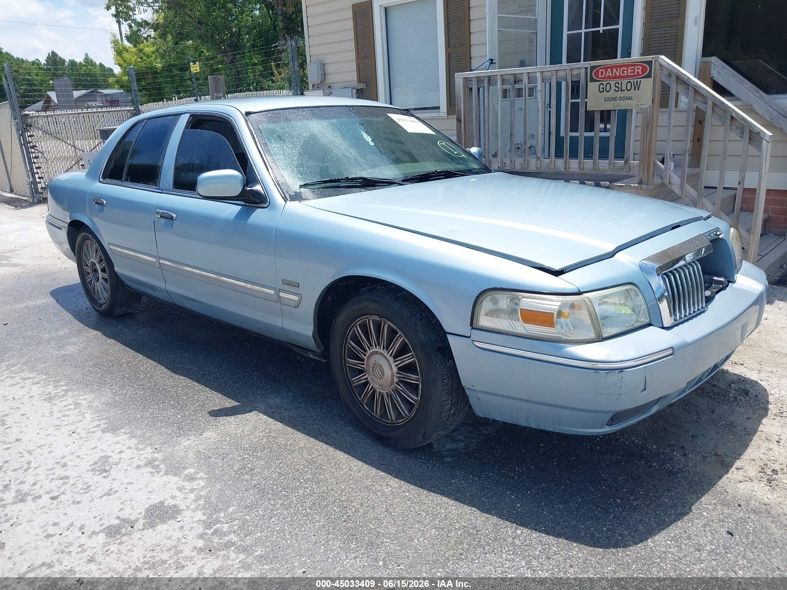 2011 Mercury Grand Marquis LS, VIN 2MEBM7FV5BX604297 — Normal wear