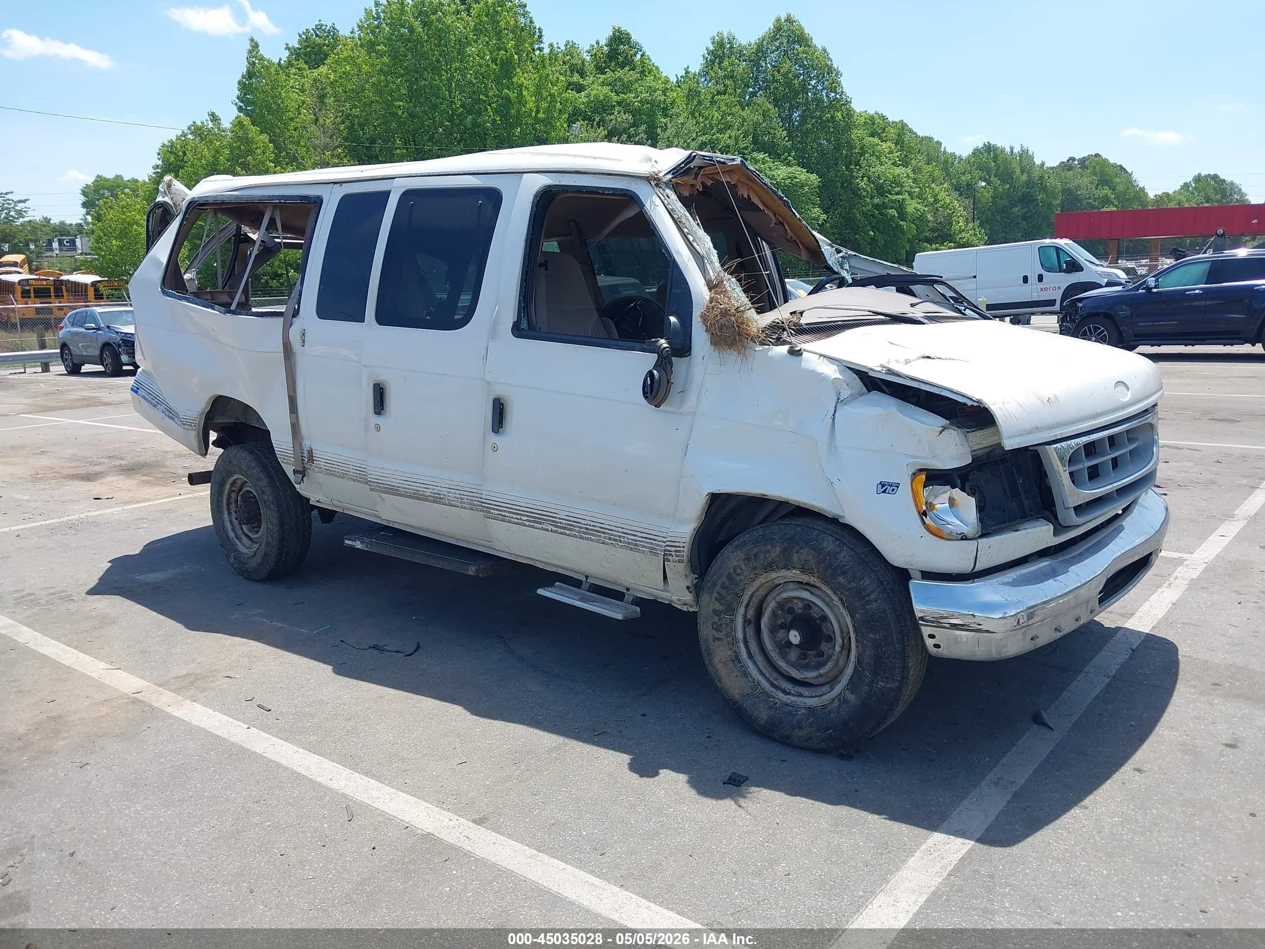 1998 Ford Econoline Wagon XL, VIN 1FBSS31S5WHC00259 — Rollover