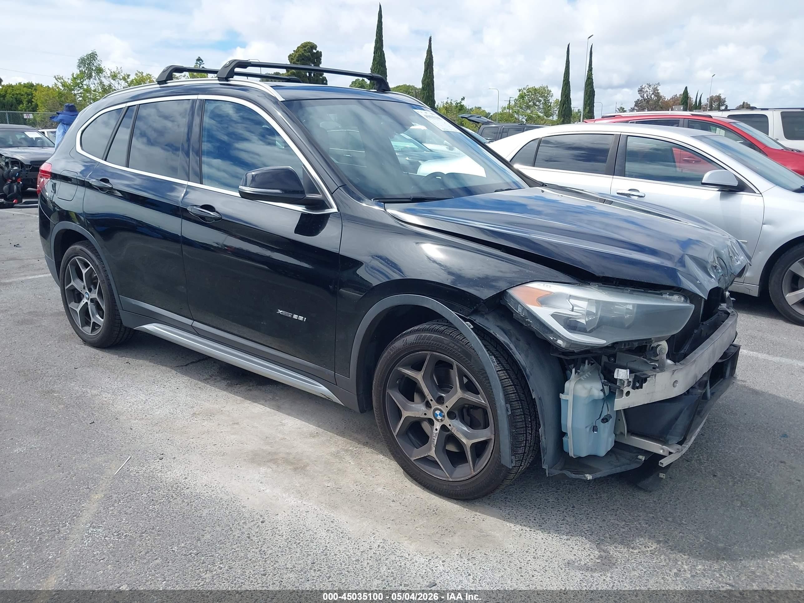 2018 BMW X1 xDrive28i, VIN WBXHT3C34J5K22016 — Front end