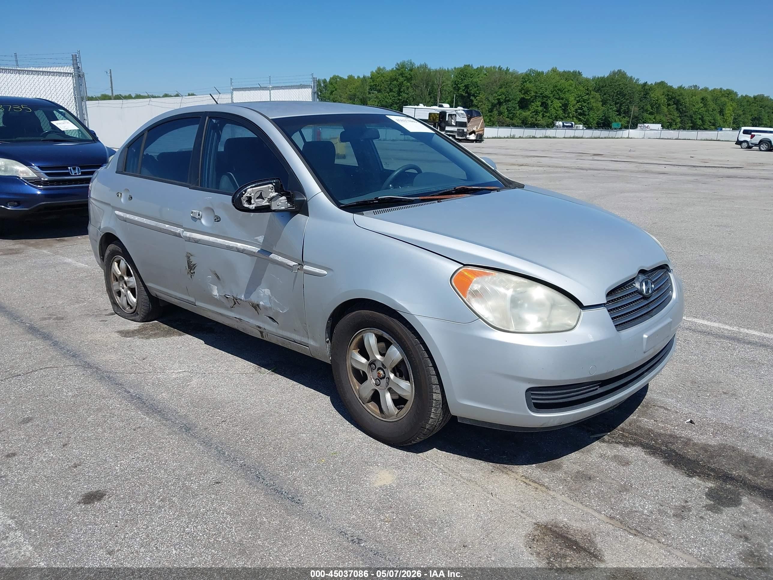 2006 Hyundai Accent GLS, VIN KMHCN46C46U057807 — Side