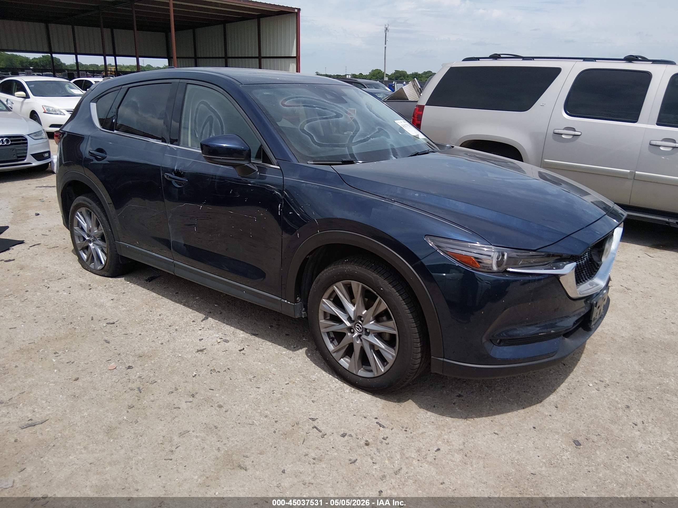 2021 Mazda CX-5 Grand Touring, VIN JM3KFBDM0M0327706 — Vandalism