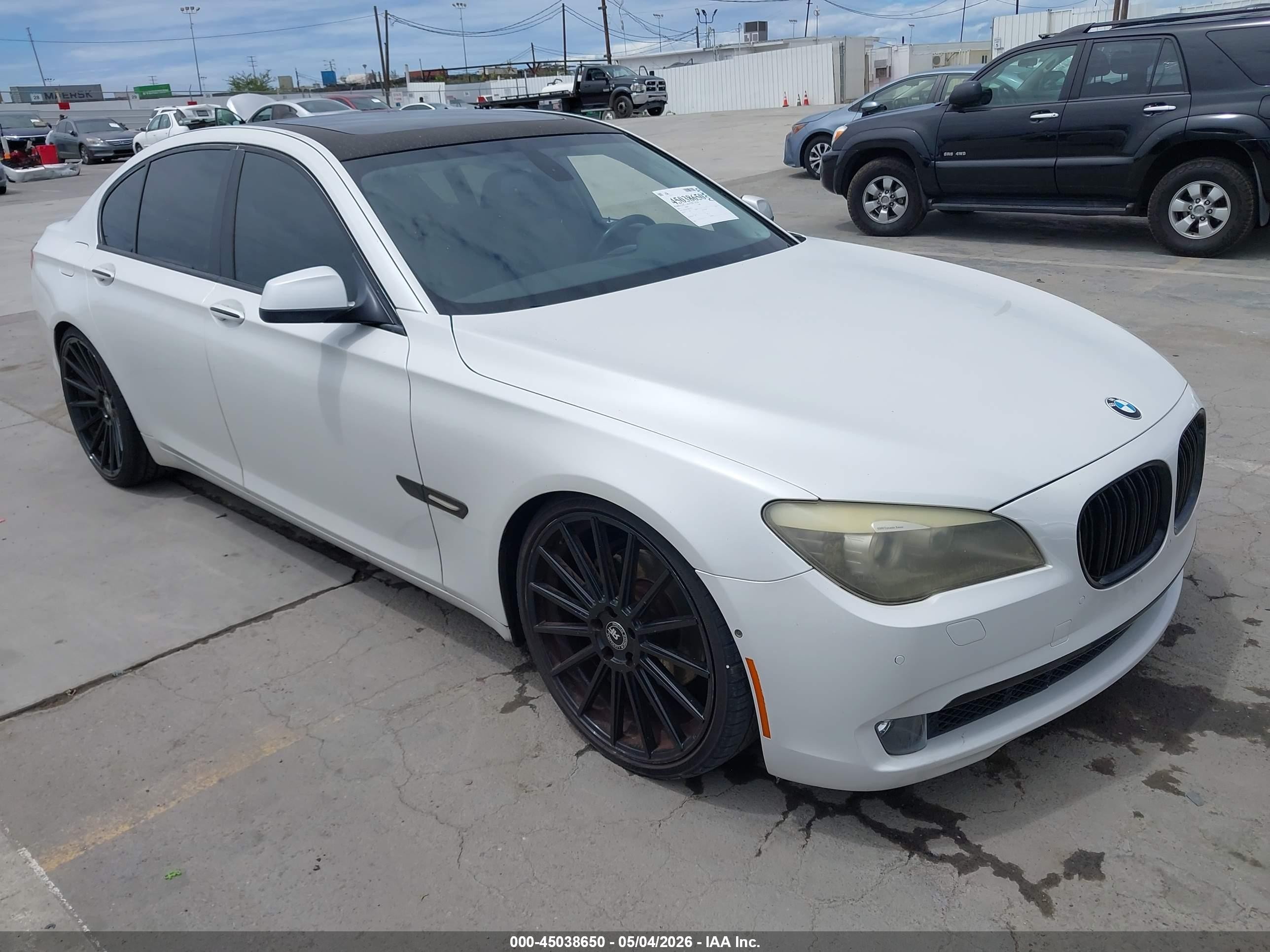 2011 BMW 7 Series 740i, VIN WBAKA4C58BC392275 — Normal wear