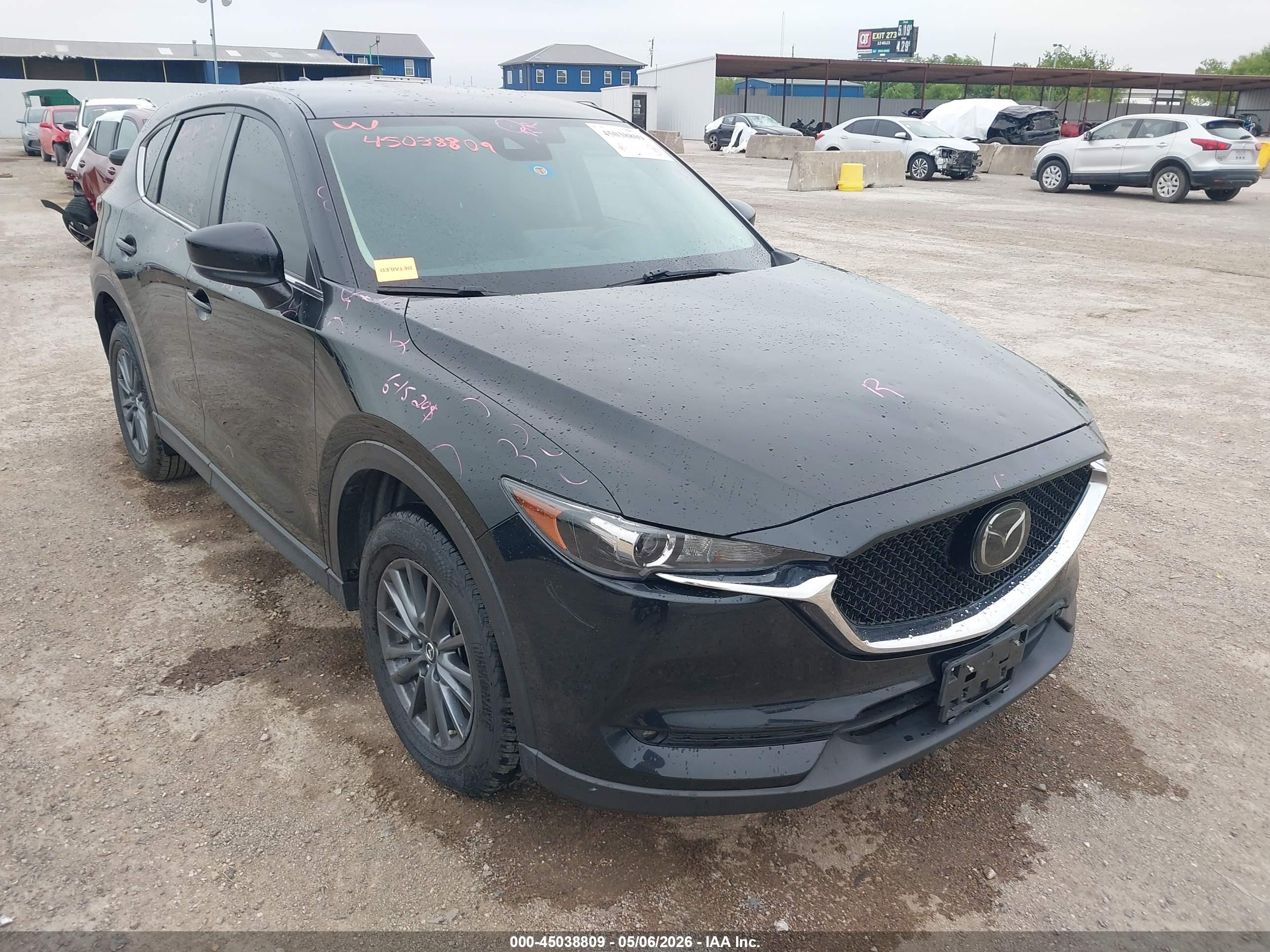 2021 Mazda CX-5 Sport, VIN JM3KFABM5M0374372 — Hail