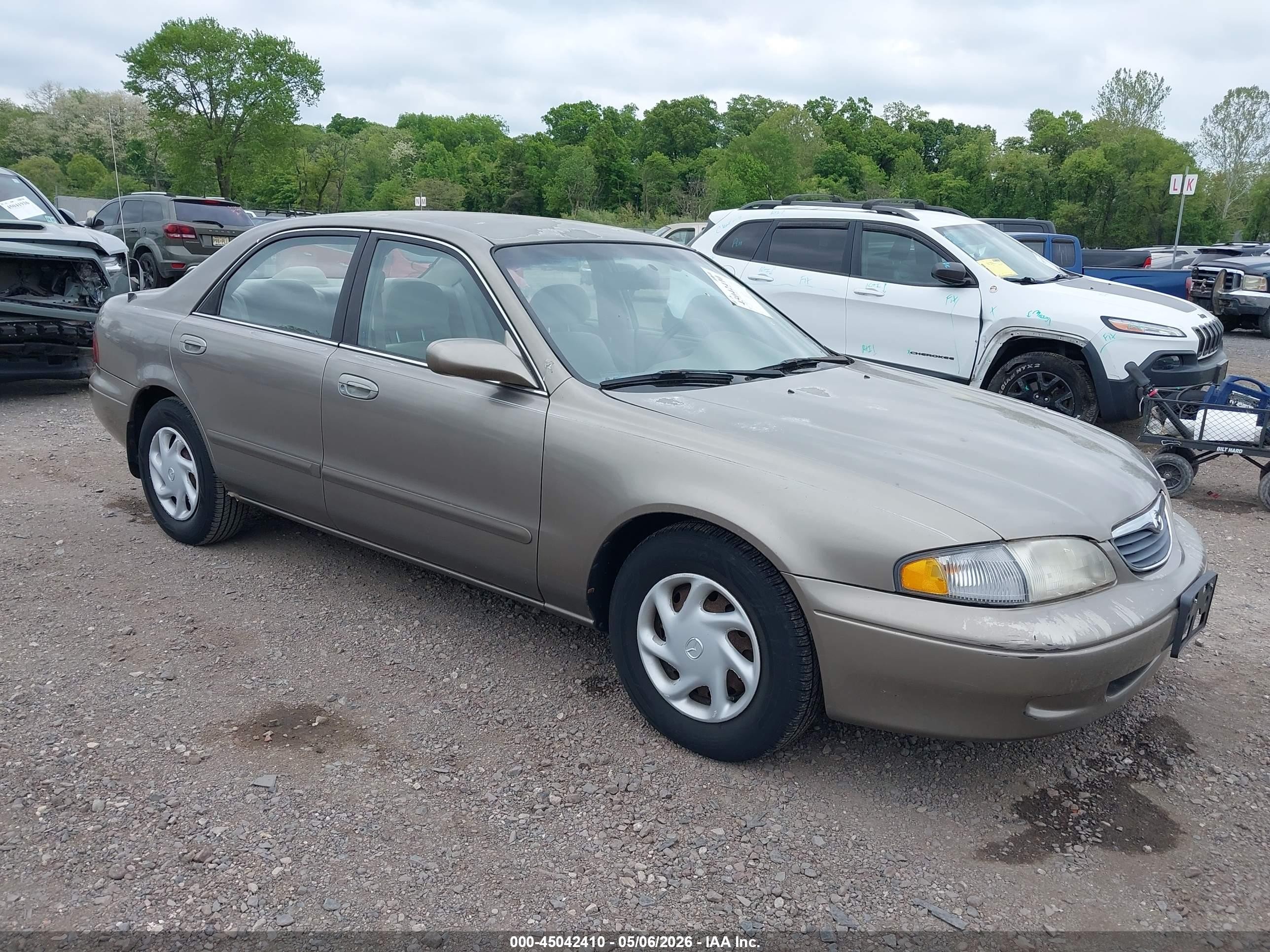 1998 Mazda 626 DX, VIN 1YVGF22C1W5727458 — Normal wear