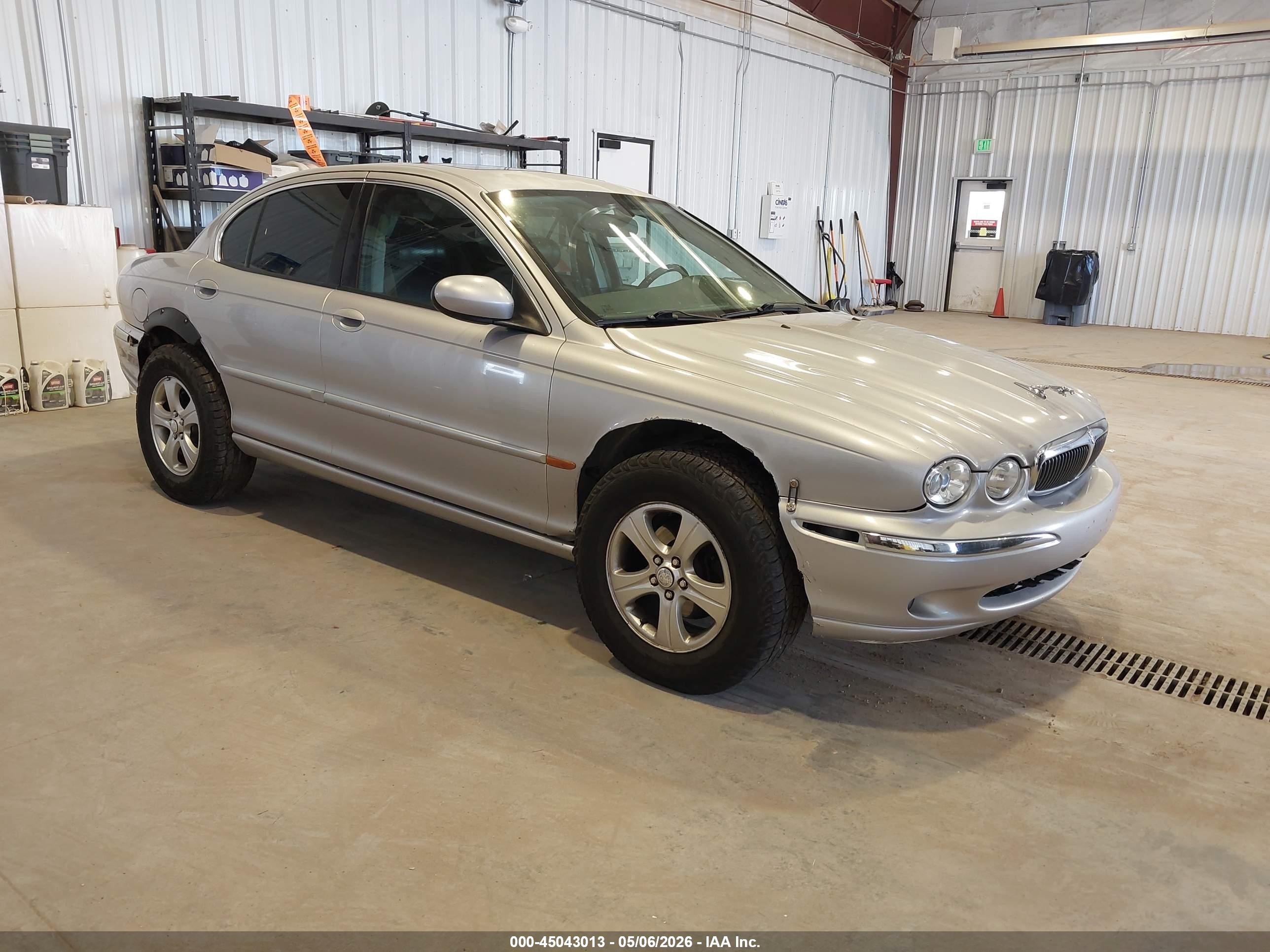 2002 Jaguar X-Type, VIN SAJEA51CX2WC32750 — Side