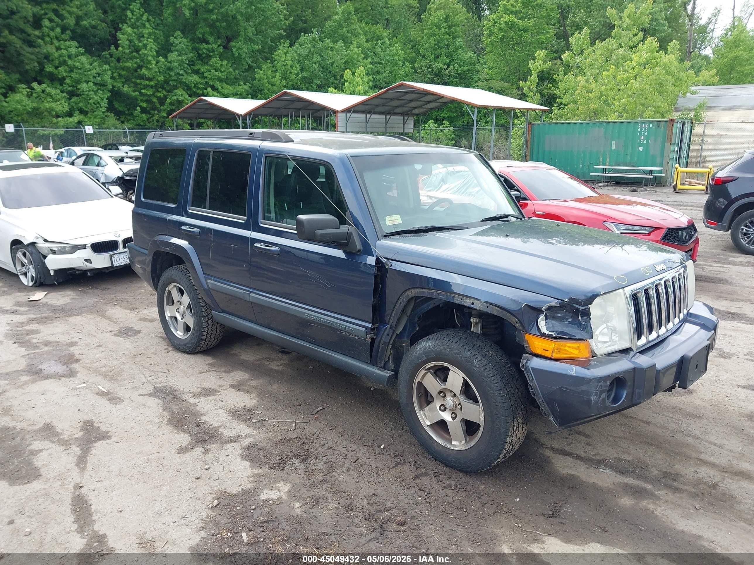 2009 Jeep Commander Sport, VIN 1J8HG48KX9C540116 — Front end
