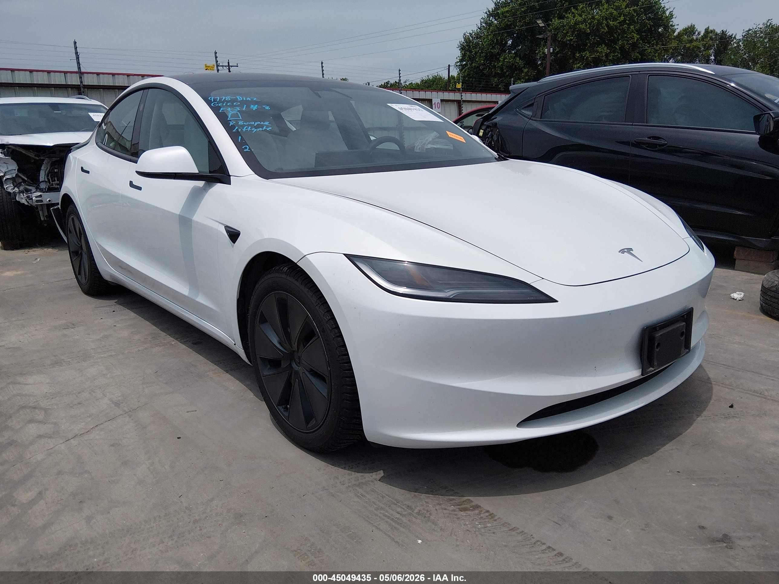 2024 Tesla Model 3 Long Range, VIN 5YJ3E1EB3RF799852 — Rear end