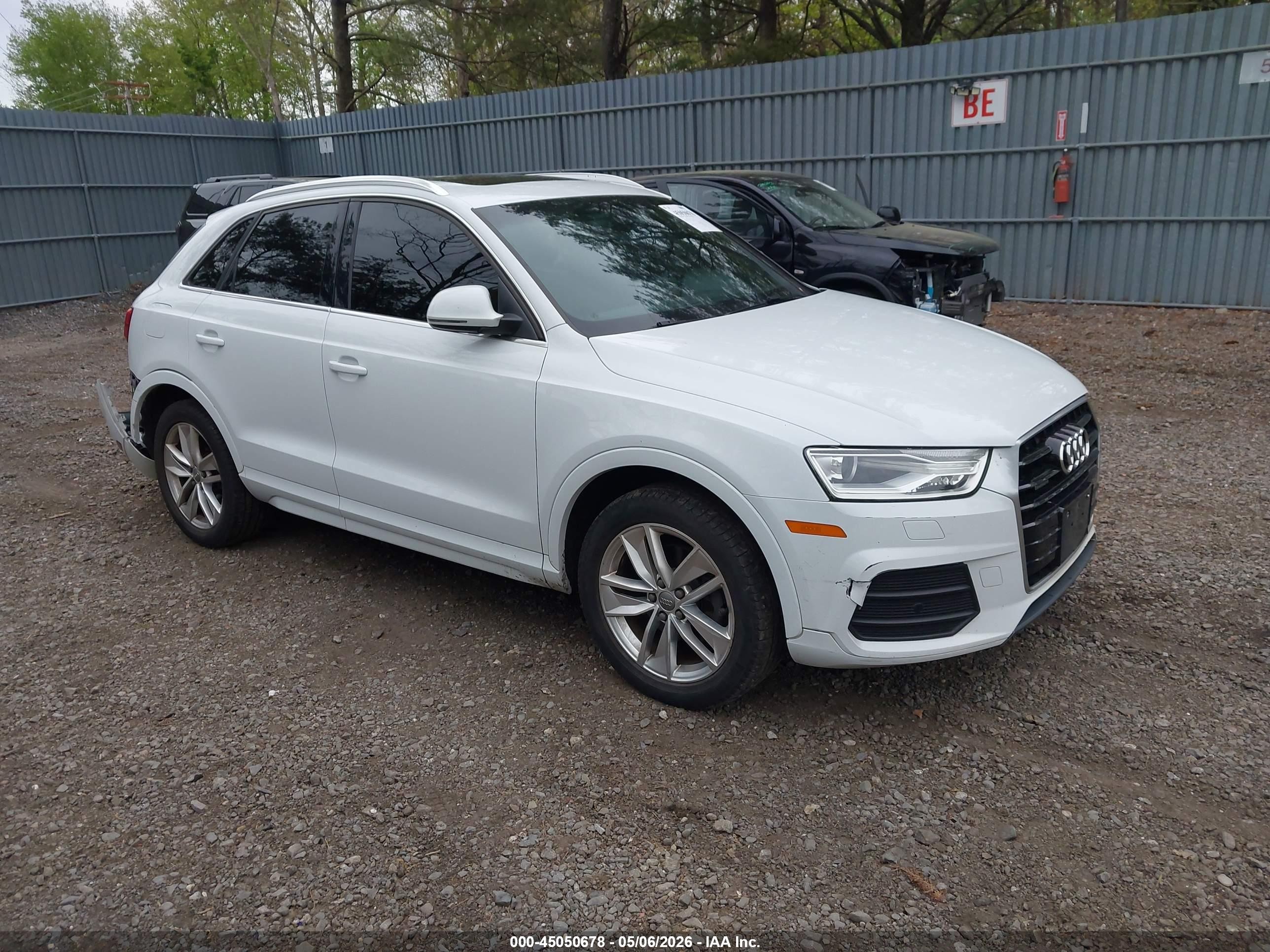 2016 Audi Q3 Premium Plus, VIN WA1EFCFS9GR016292 — Rear end