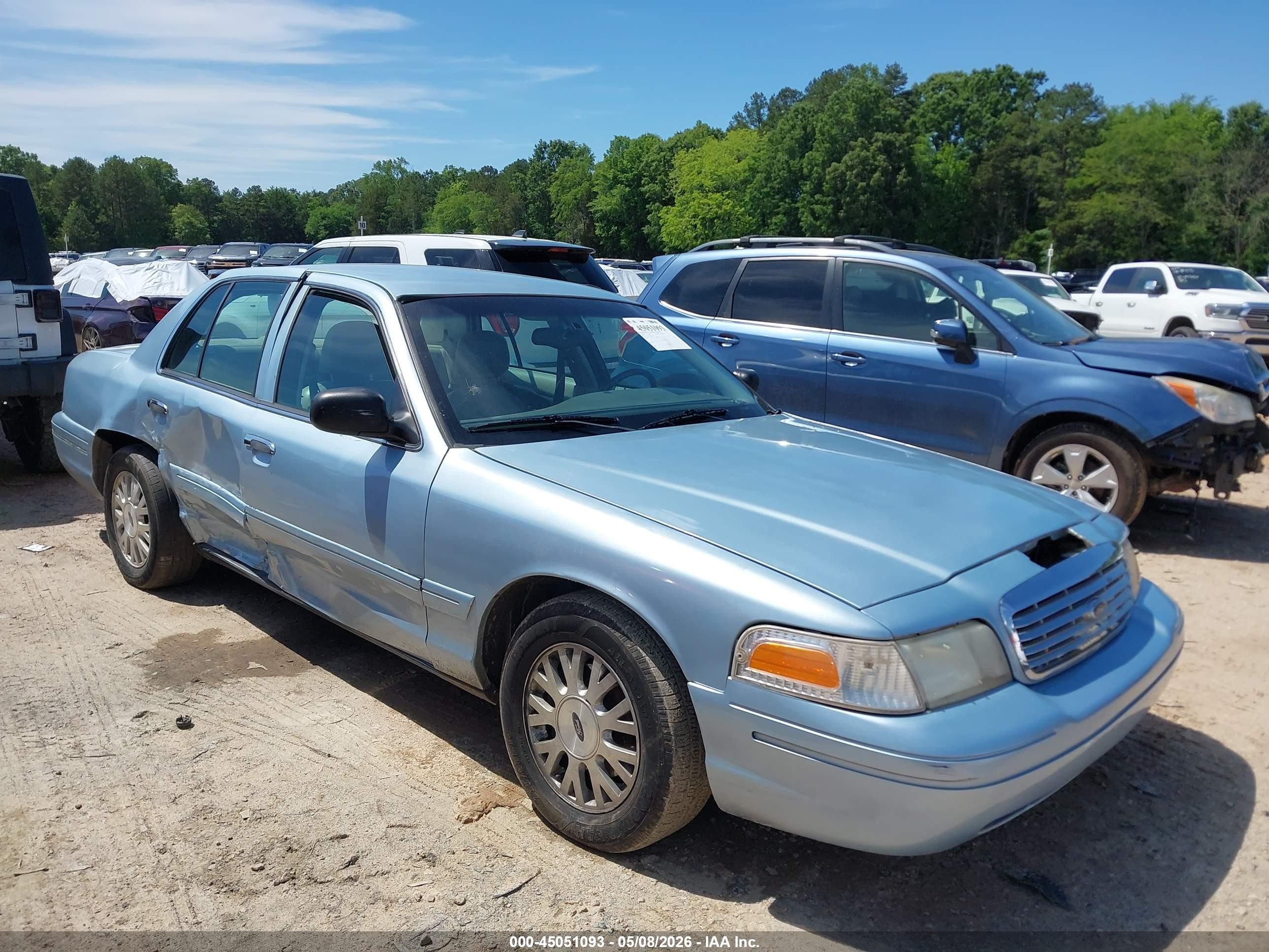 2003 Ford Crown Victoria LX, VIN 2FAFP74W83X180076 — Side