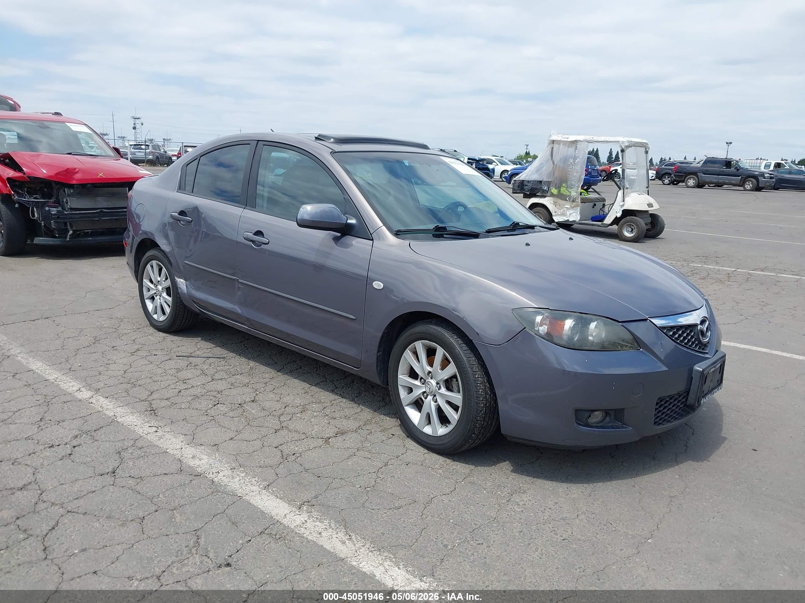 2007 Mazda 3 i Touring, VIN JM1BK12G171638538 — Side