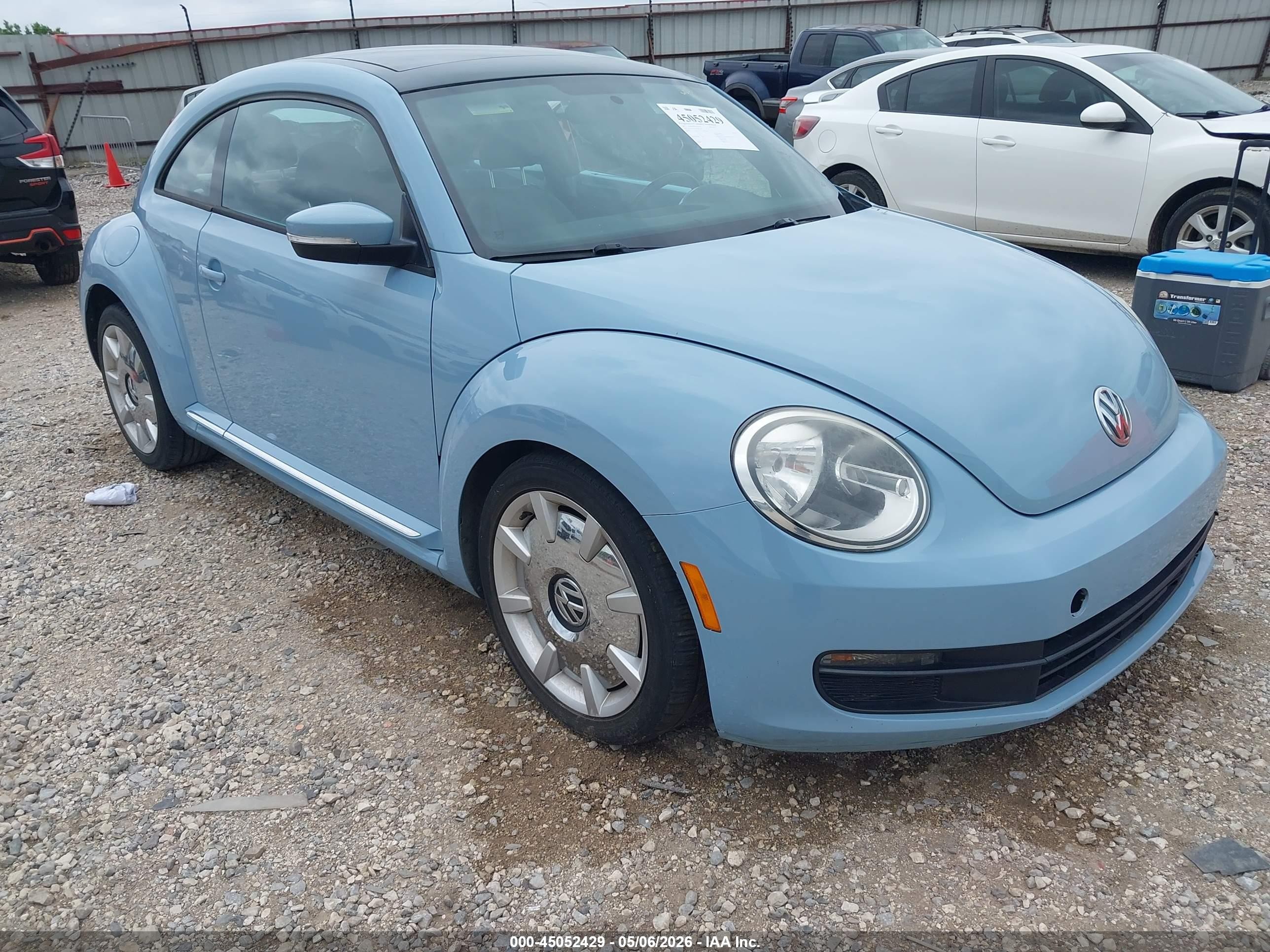 2012 Volkswagen Beetle 2.5L, VIN 3VWJX7AT7CM661198 — Side