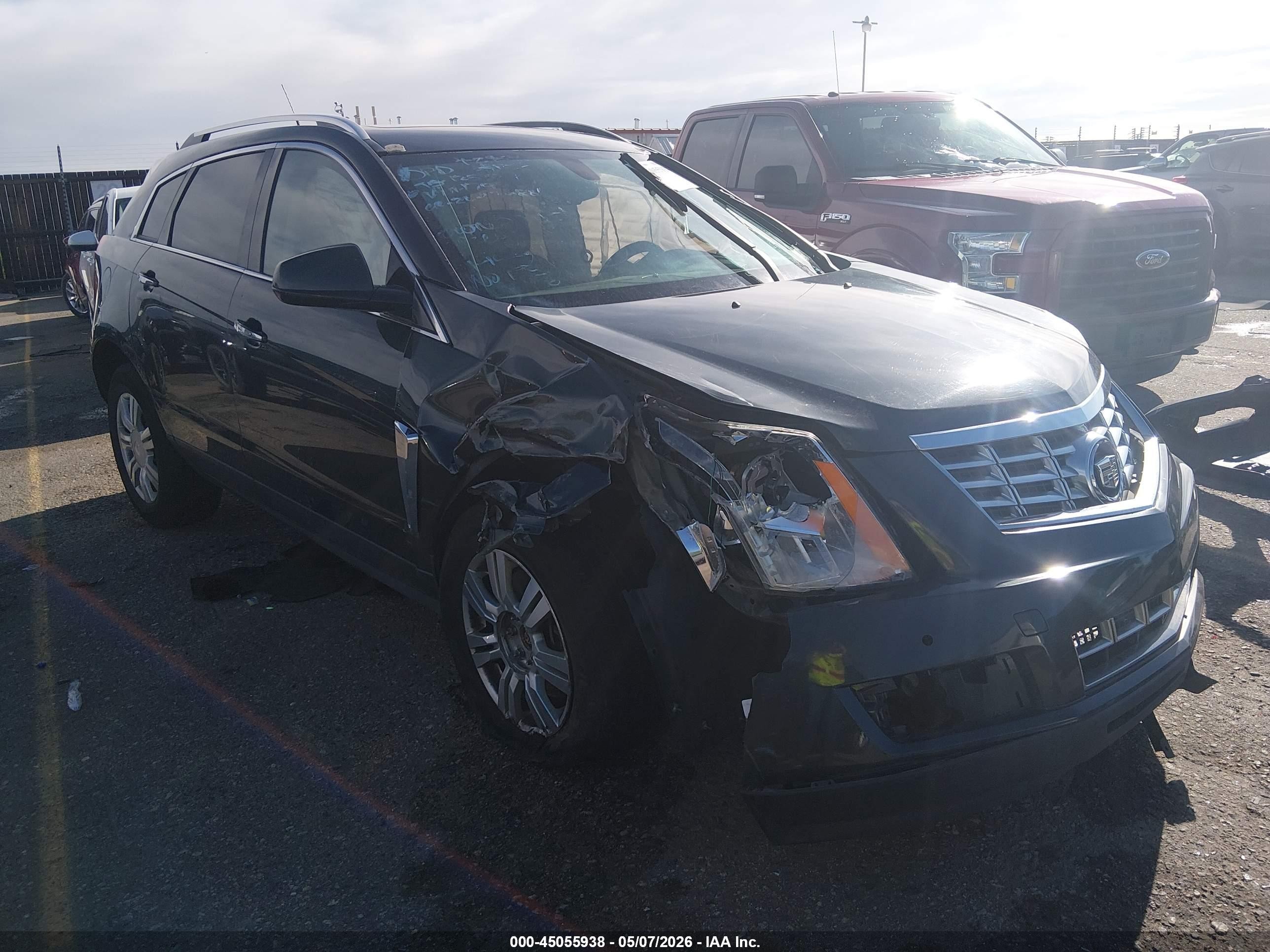 2014 Cadillac SRX Luxury Collection, VIN 3GYFNEE35ES651792 — Front end