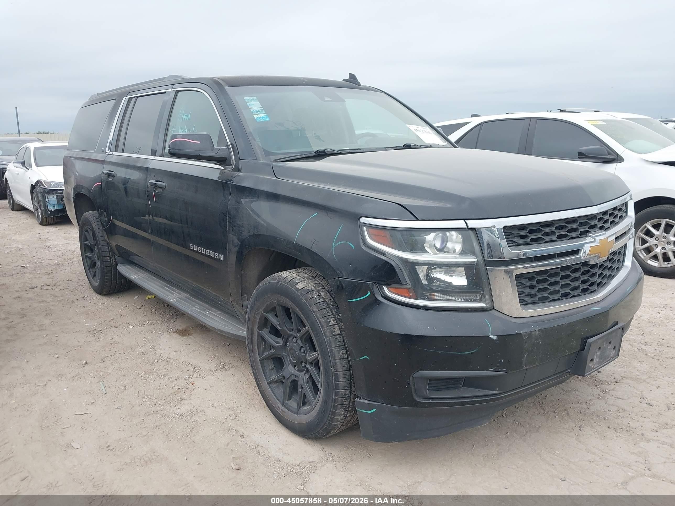 2015 Chevrolet Suburban LT, VIN 1GNSCJKCXFR709768 — Water / flood