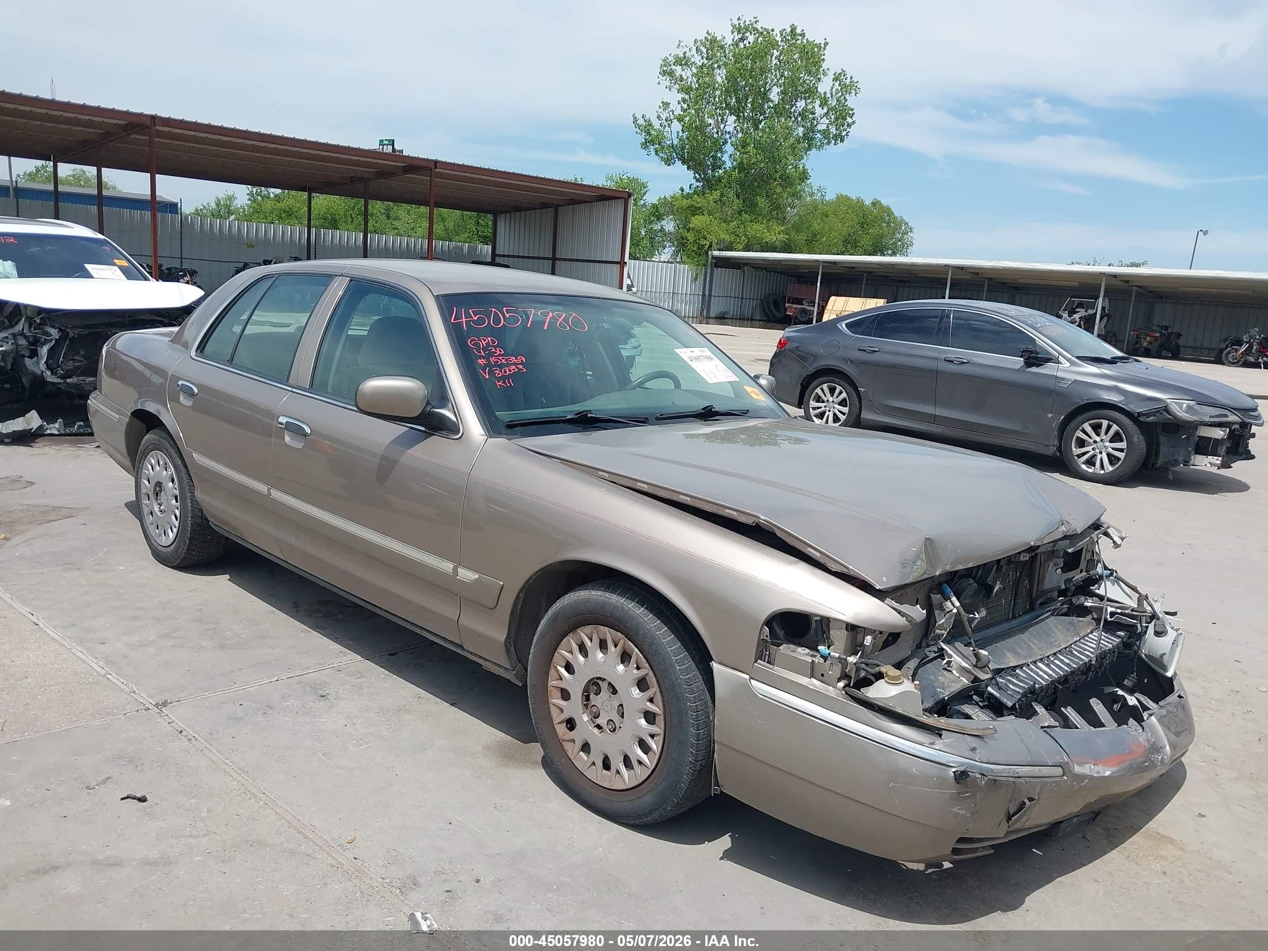 2004 Mercury Grand Marquis GS, VIN 2MEFM74W24X630033 — Side