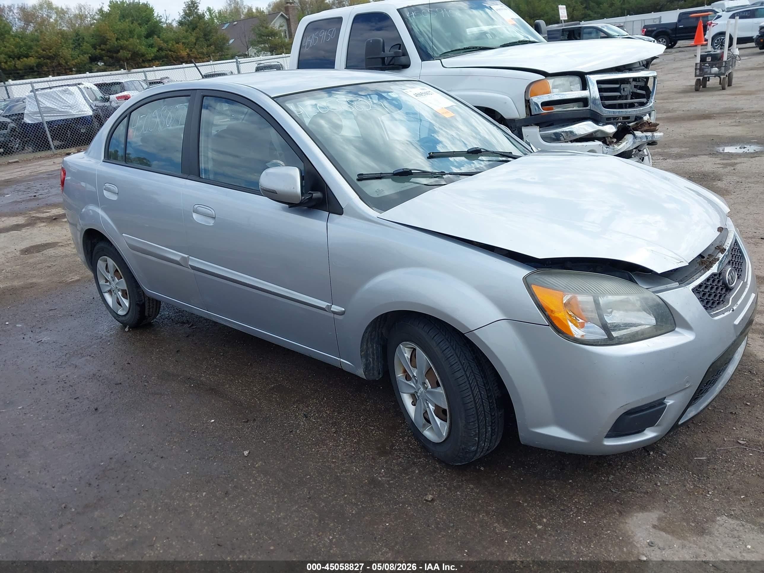 2011 Kia Rio LX, VIN KNADH4A37B6921297 — Бок