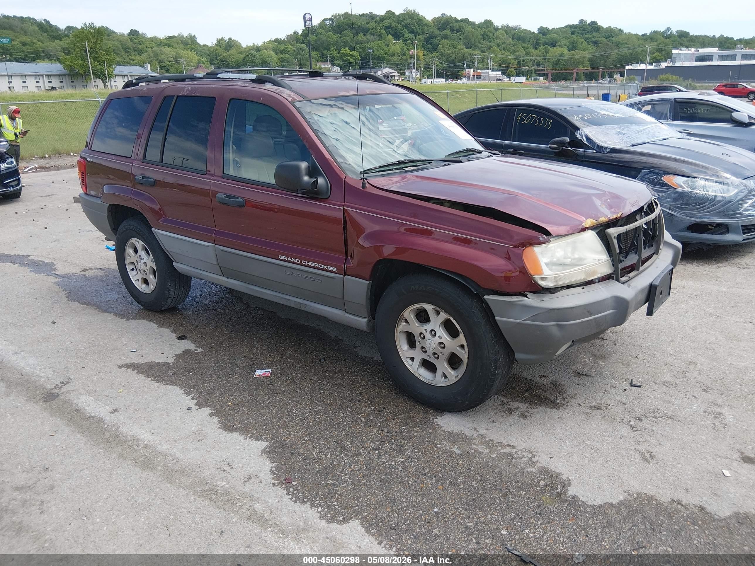 1999 Jeep Grand Cherokee Laredo, VIN 1J4GW58S3XC796066 — Side
