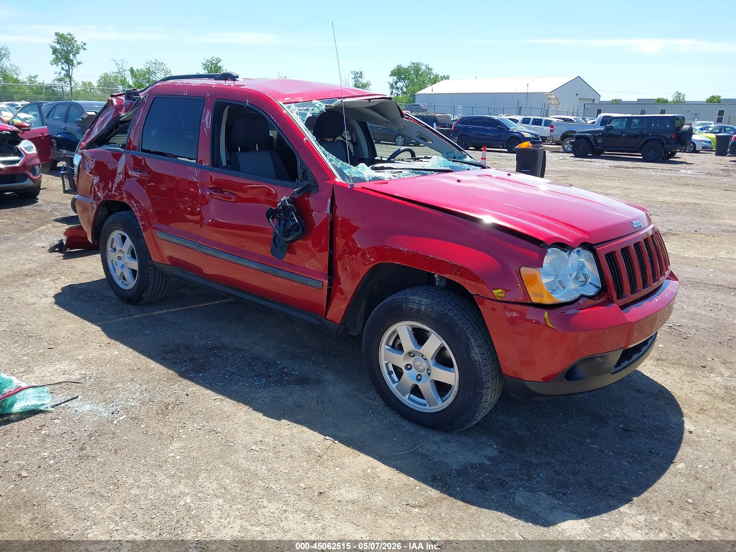2009 Jeep Grand Cherokee Laredo, VIN 1J8GR48K89C544221 — Rollover