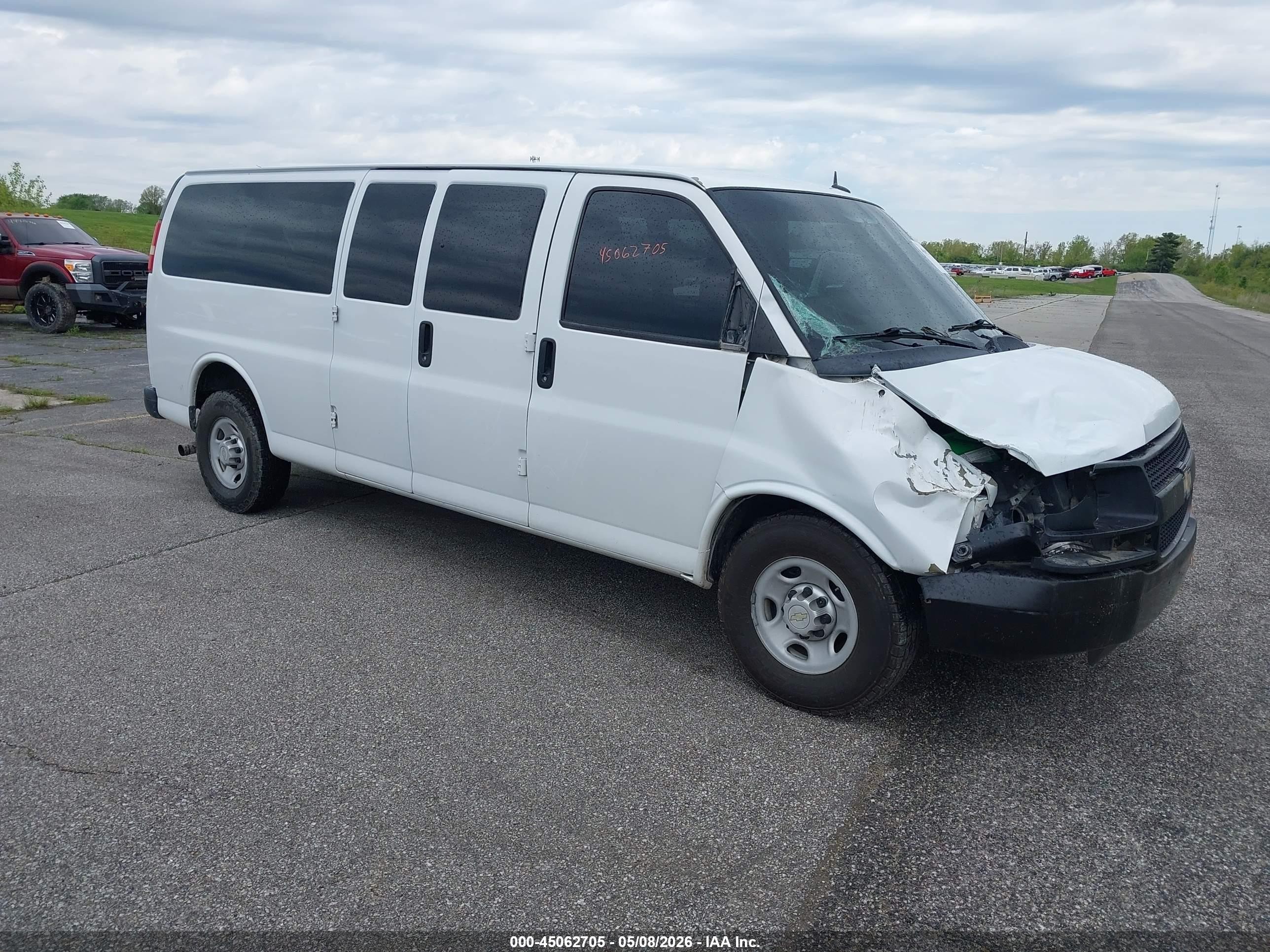 2014 Chevrolet Express Passenger LS, VIN 1GAZGZFAXE1123385 — Front end