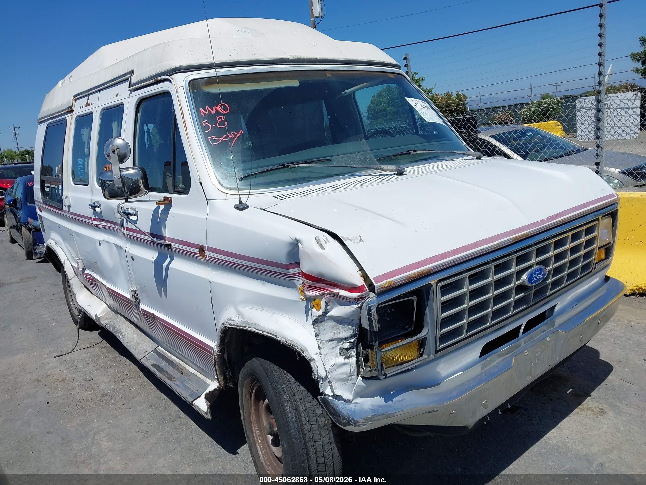 1991 Ford Econoline Cargo, VIN 1FDEE14HXMHB12966 — Side