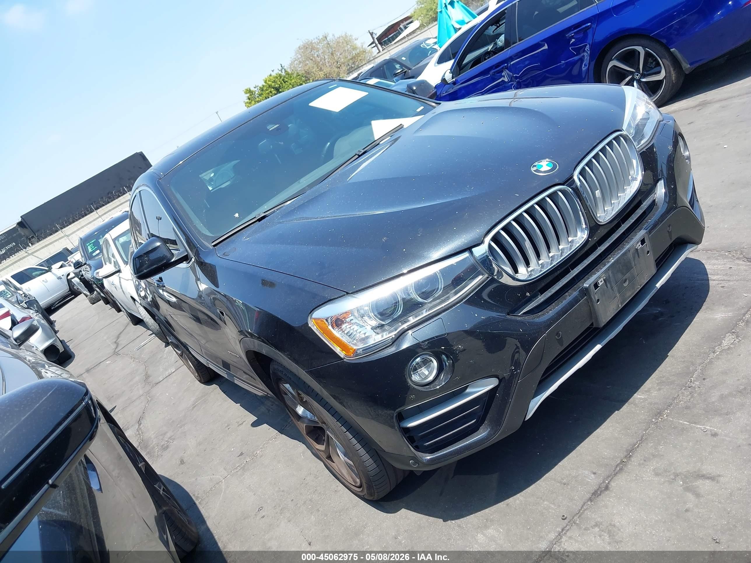 2018 BMW X4 xDrive28i, VIN 5UXXW3C57J0Z60065 — Зад