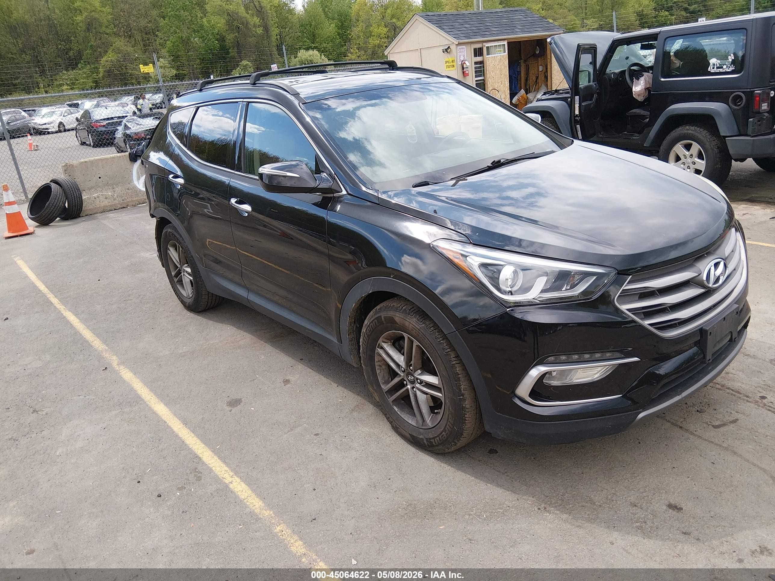2017 Hyundai Santa Fe 2.4L, VIN 5XYZUDLB1HG408979 — Rear end