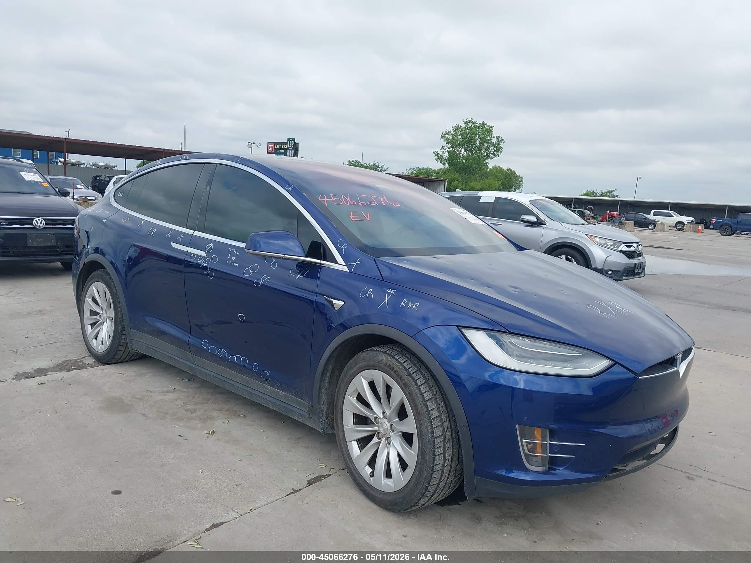 2021 Tesla Model X Long Range Plus, VIN 5YJXCBE20MF323340 — Hail