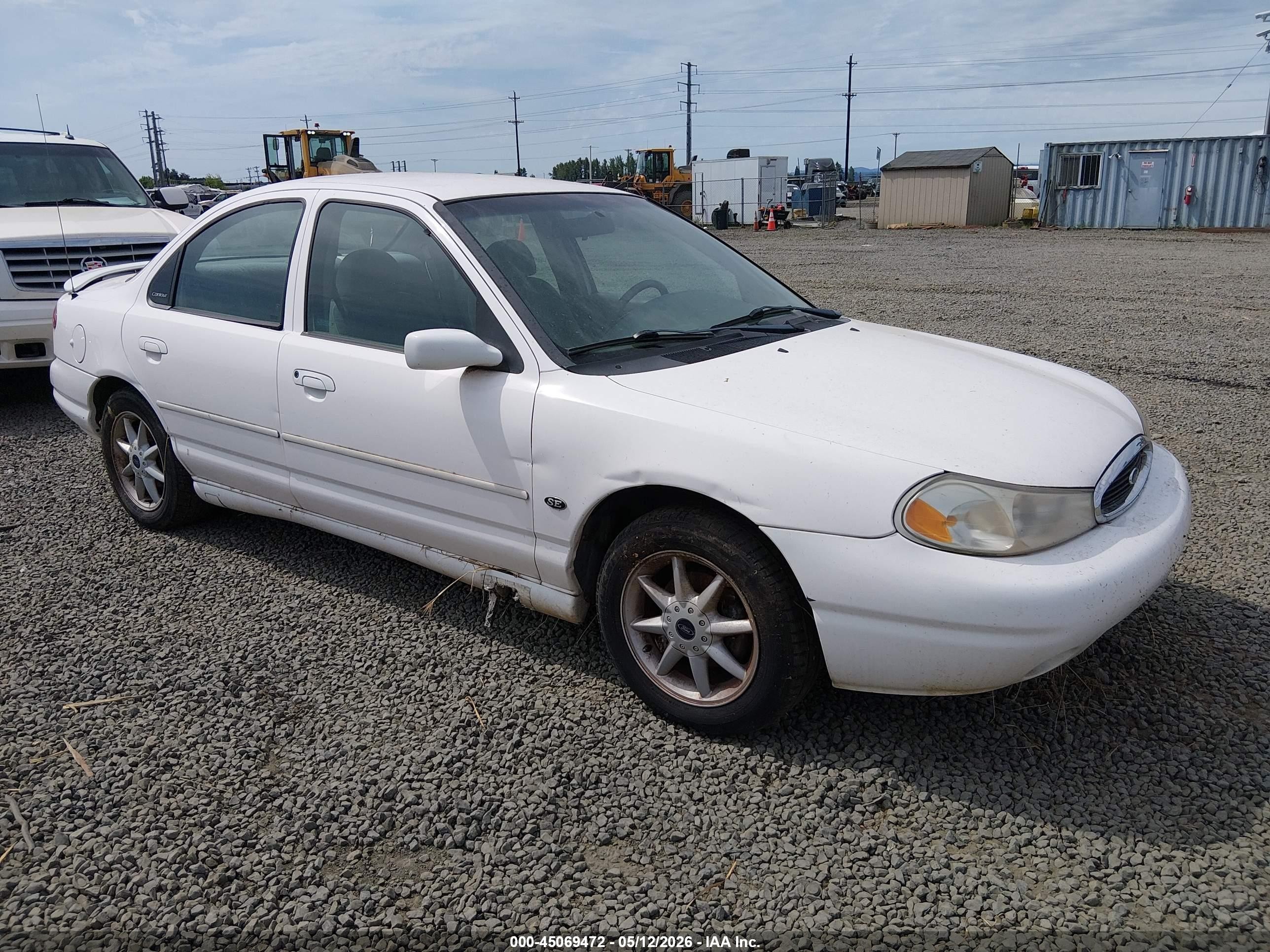 1998 Ford Contour LX, VIN 1FAFP66L2WK302371 — Normal wear
