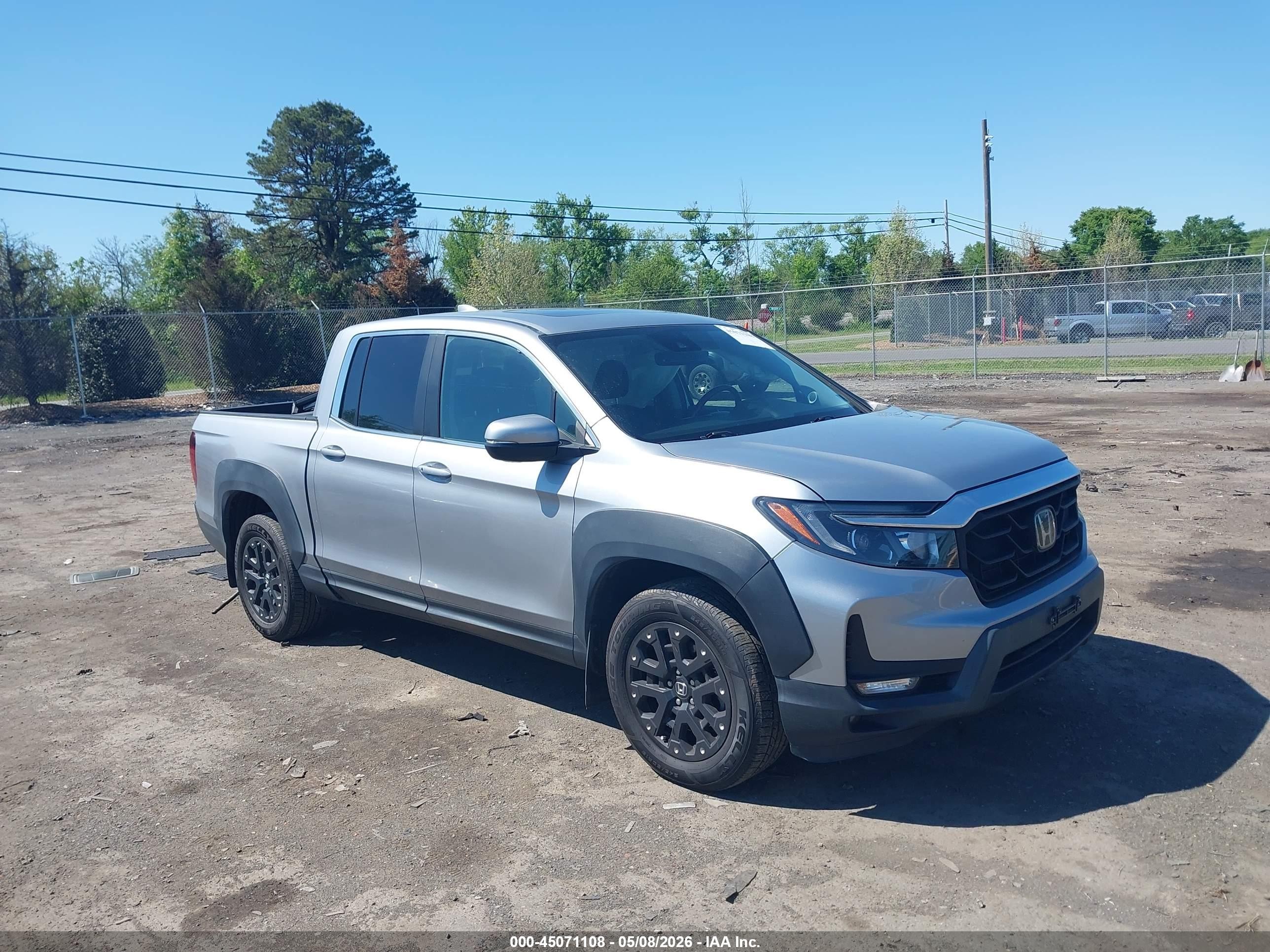 2021 Honda Ridgeline RTL, VIN 5FPYK3F58MB007214 — Side