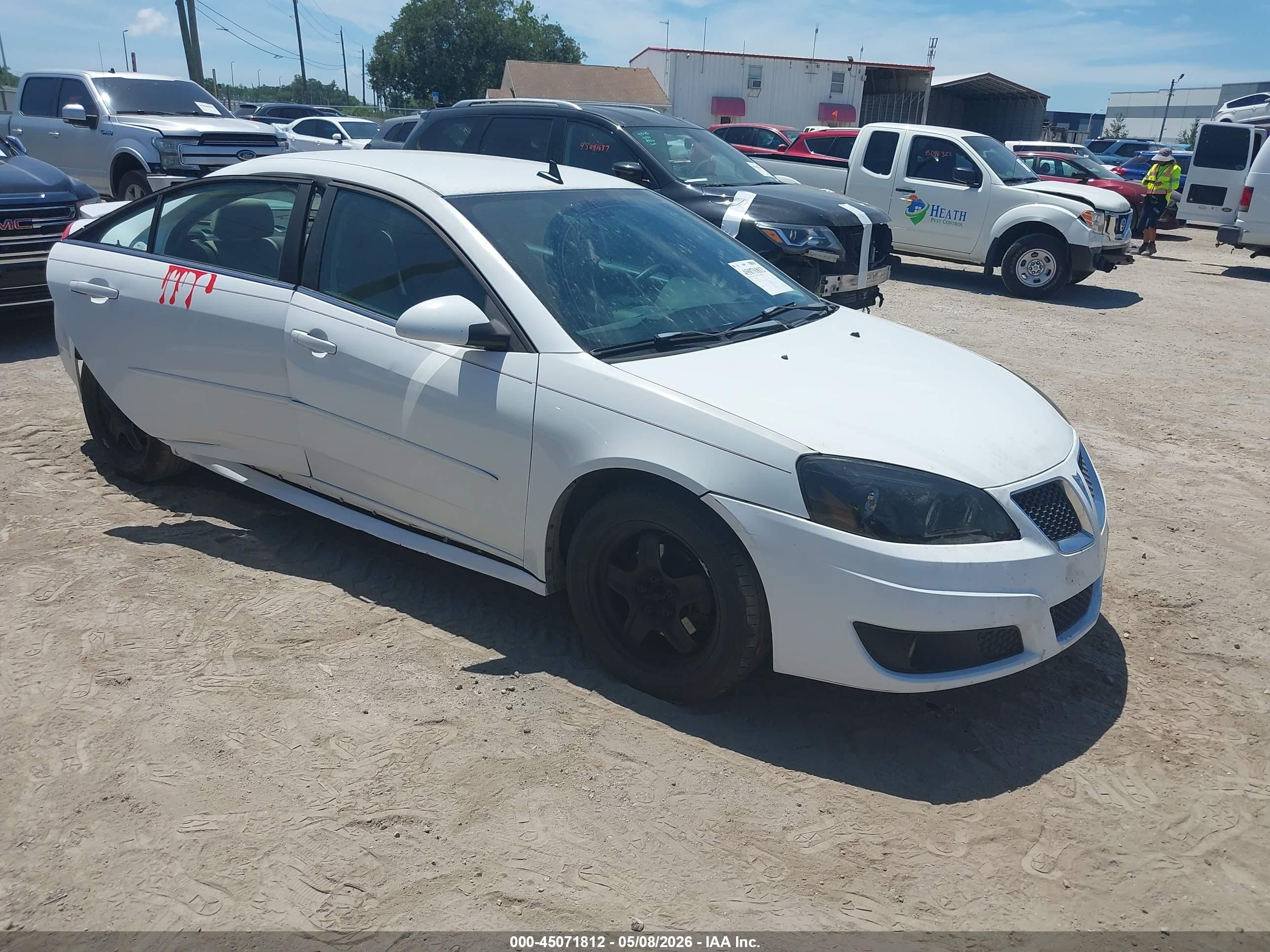 2010 Pontiac G6 1SH, VIN 1G2ZA5EK8A4130294 — Side