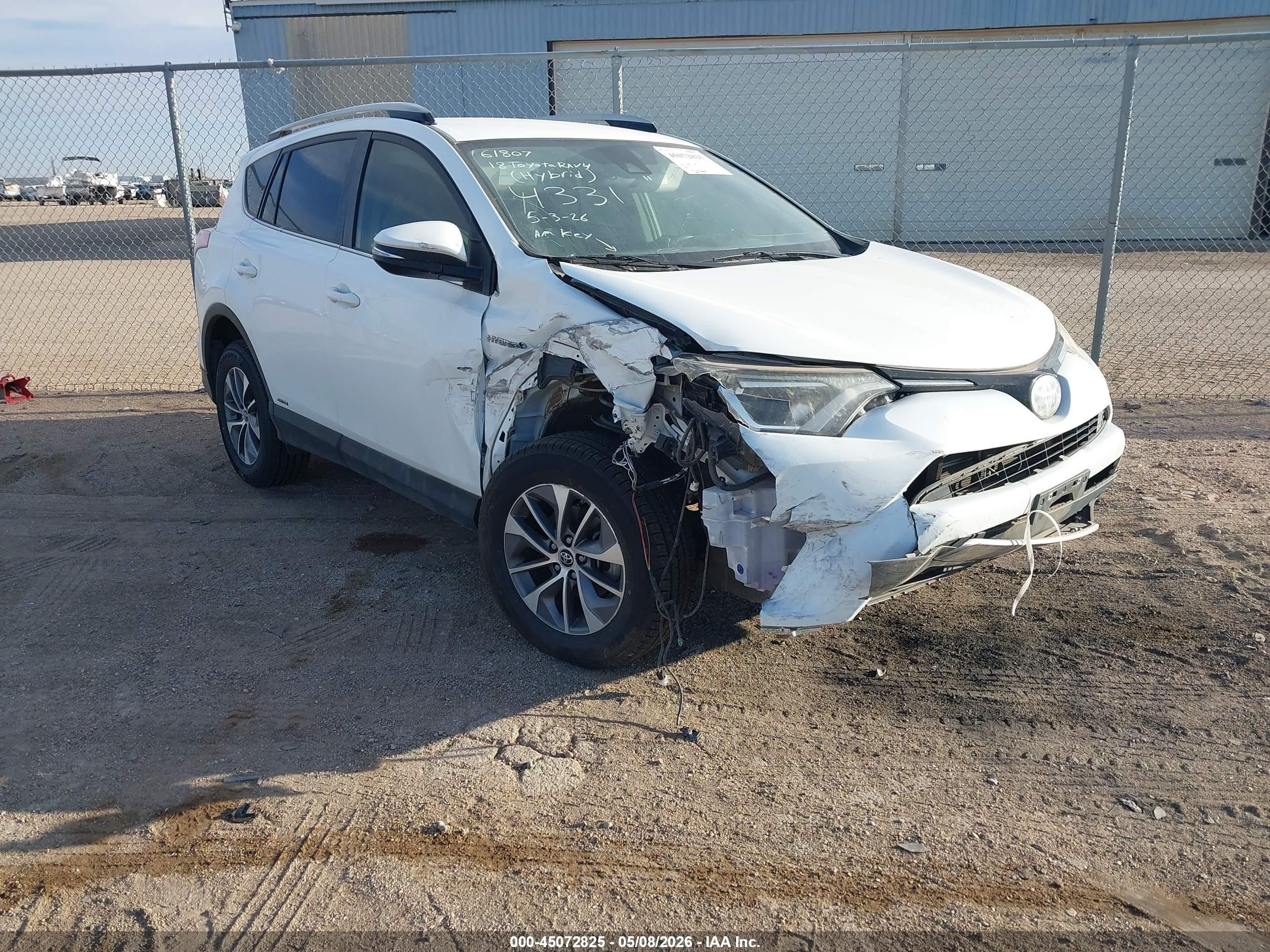 2018 Toyota RAV4 Hybrid LE, VIN JTMRJREV3JD174331 — Front end