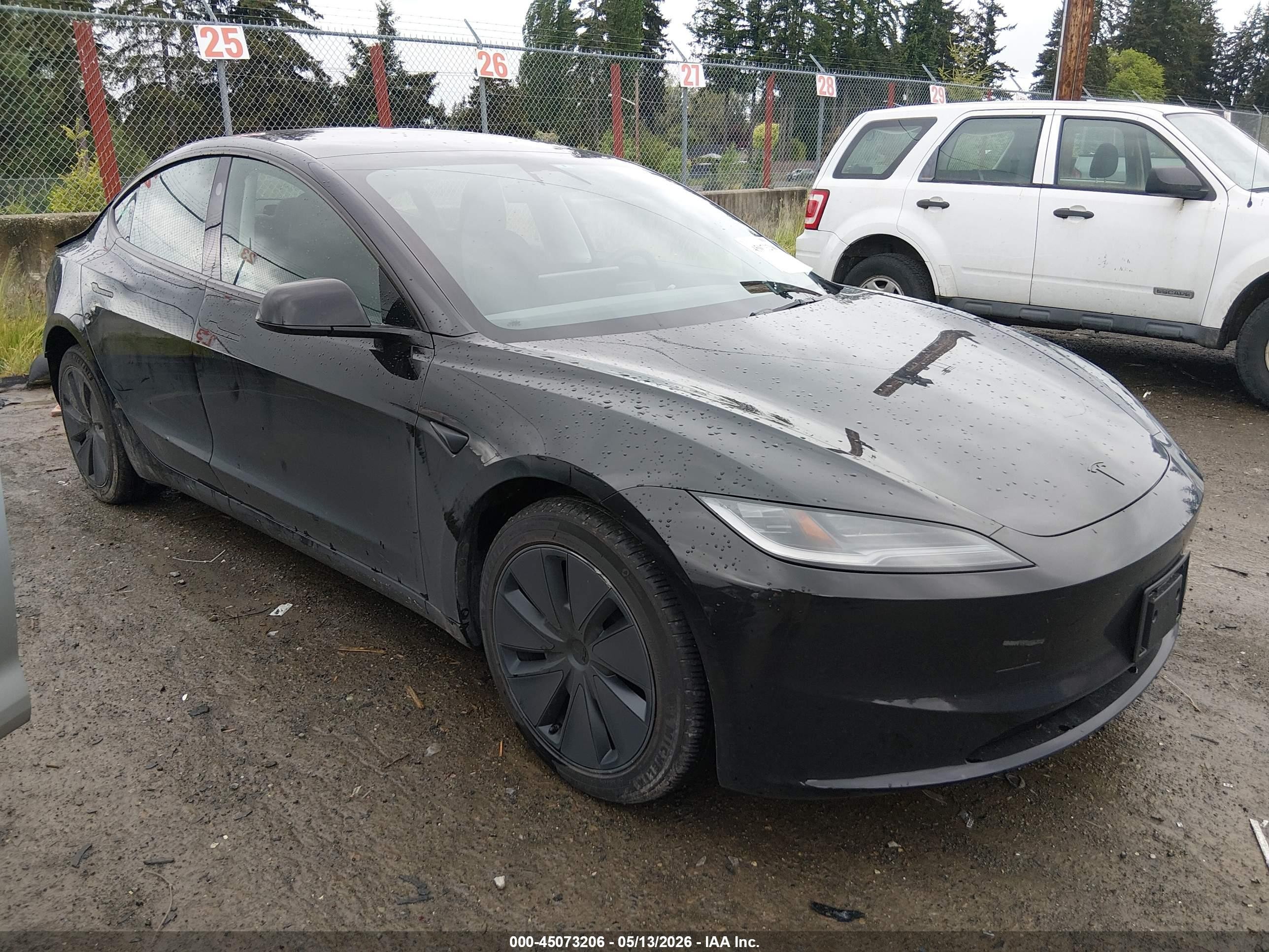 2026 Tesla Model 3 Premium, VIN 5YJ3E1EB6TF132278 — Rear end