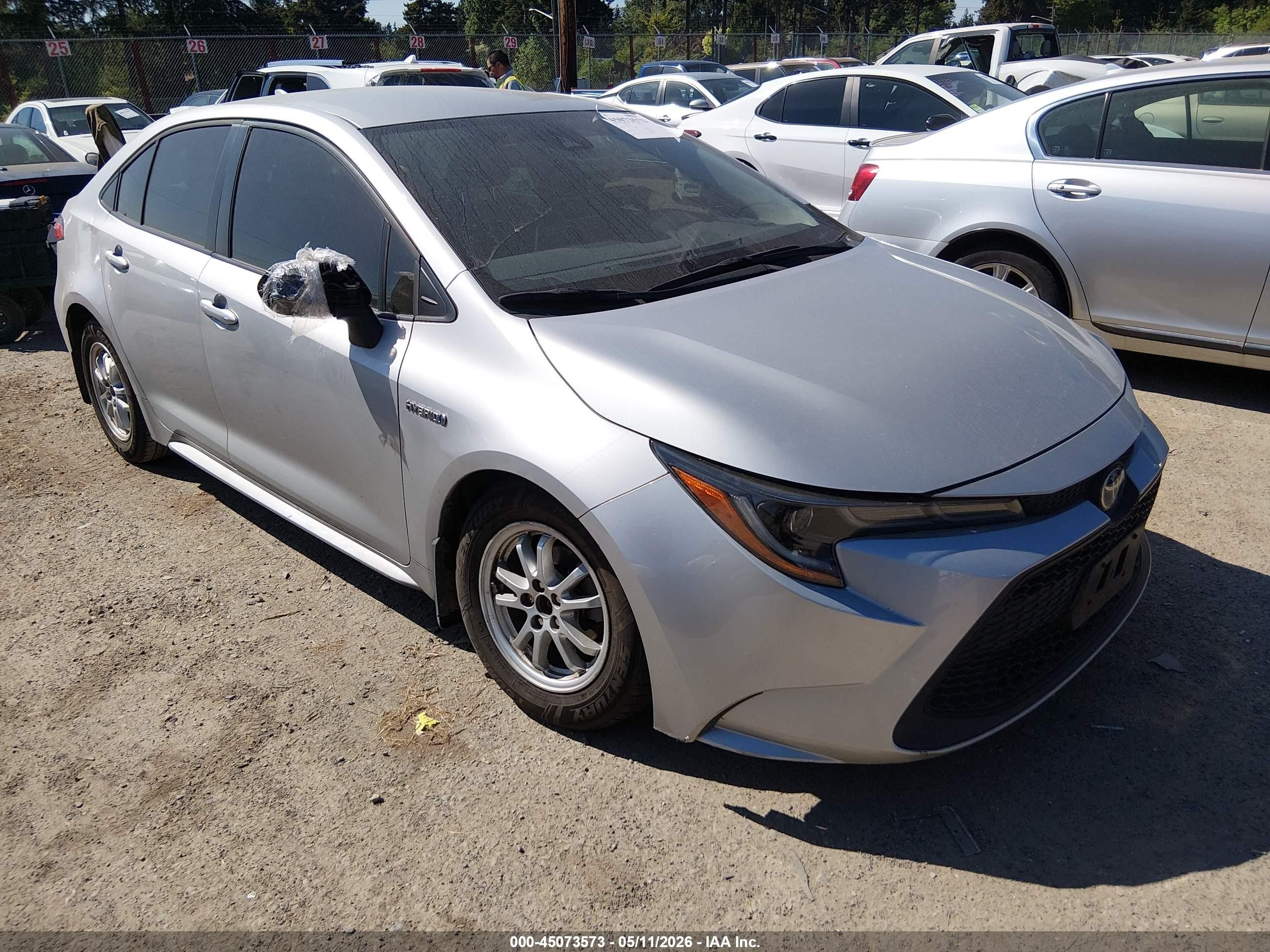 2021 Toyota Corolla Hybrid LE, VIN JTDEAMDEXMJ006842 — Side