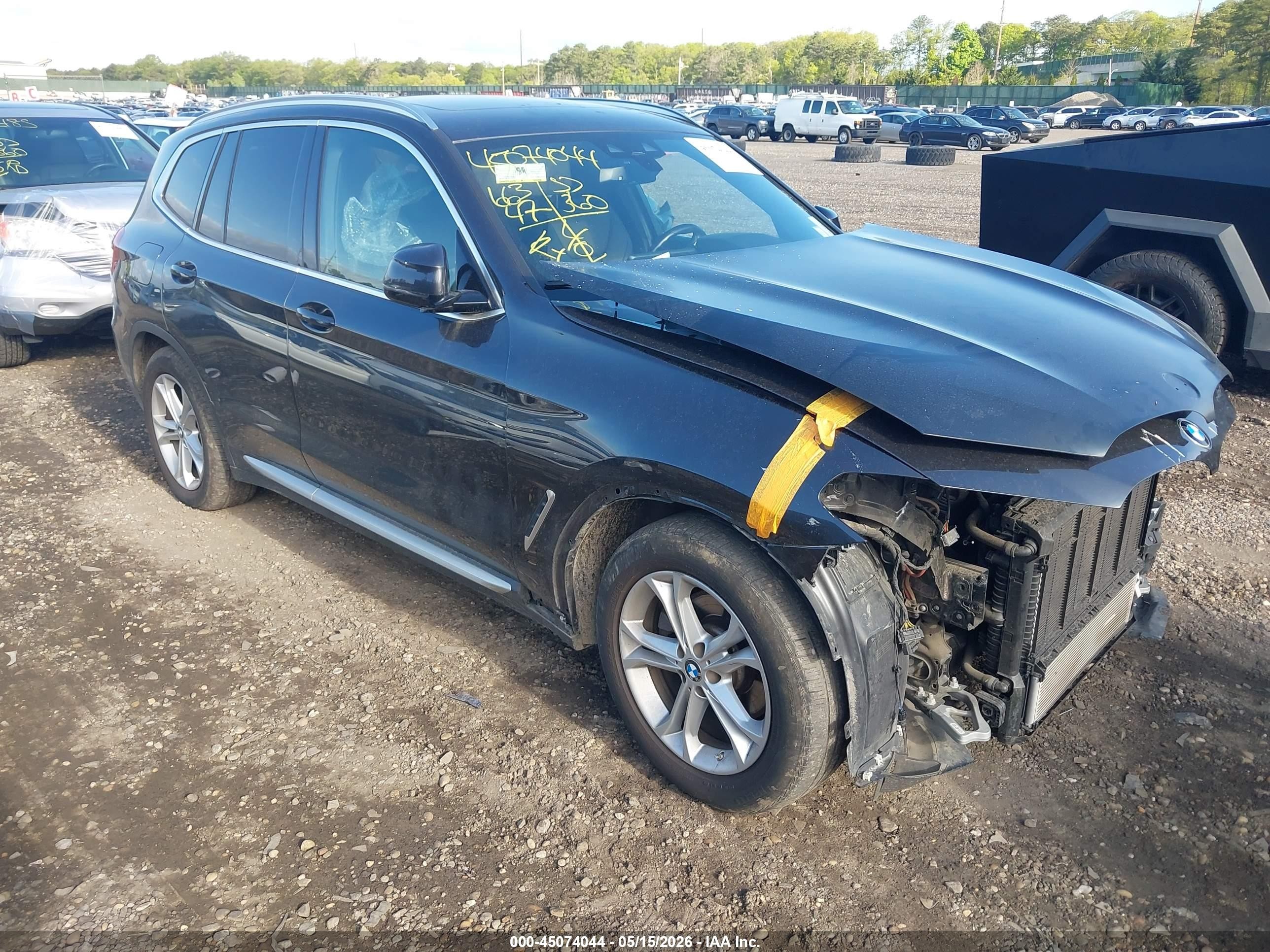 2021 BMW X3 xDrive30e, VIN 5UXTS1C05M9G76830 — Front end