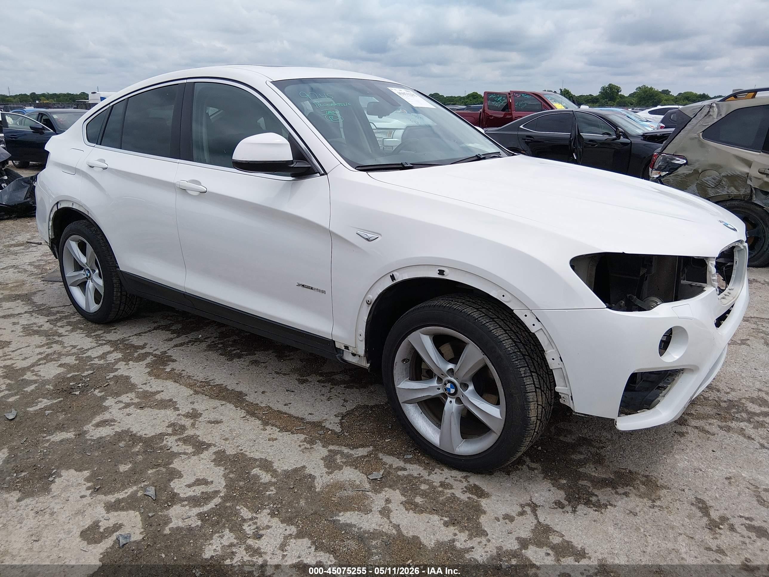2017 BMW X4 xDrive28i, VIN 5UXXW3C5XH0R23408 — Rear end