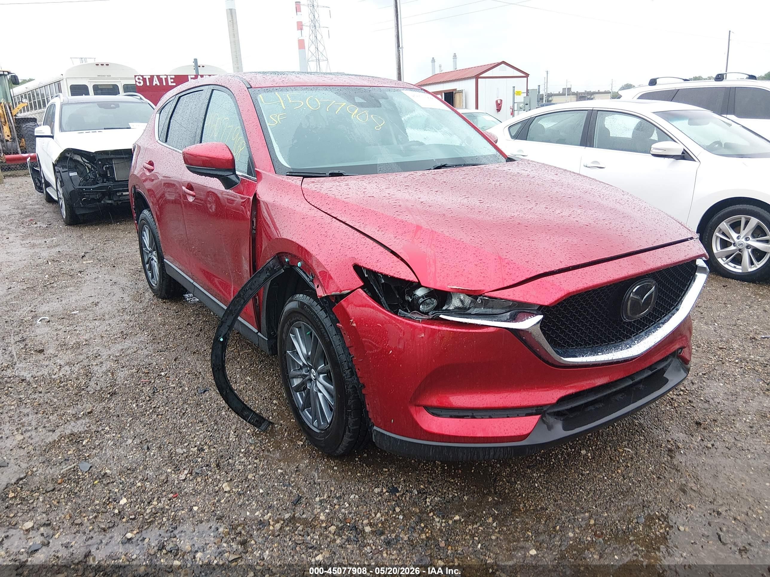 2021 Mazda CX-5 Touring, VIN JM3KFBCM1M0367777 — Side