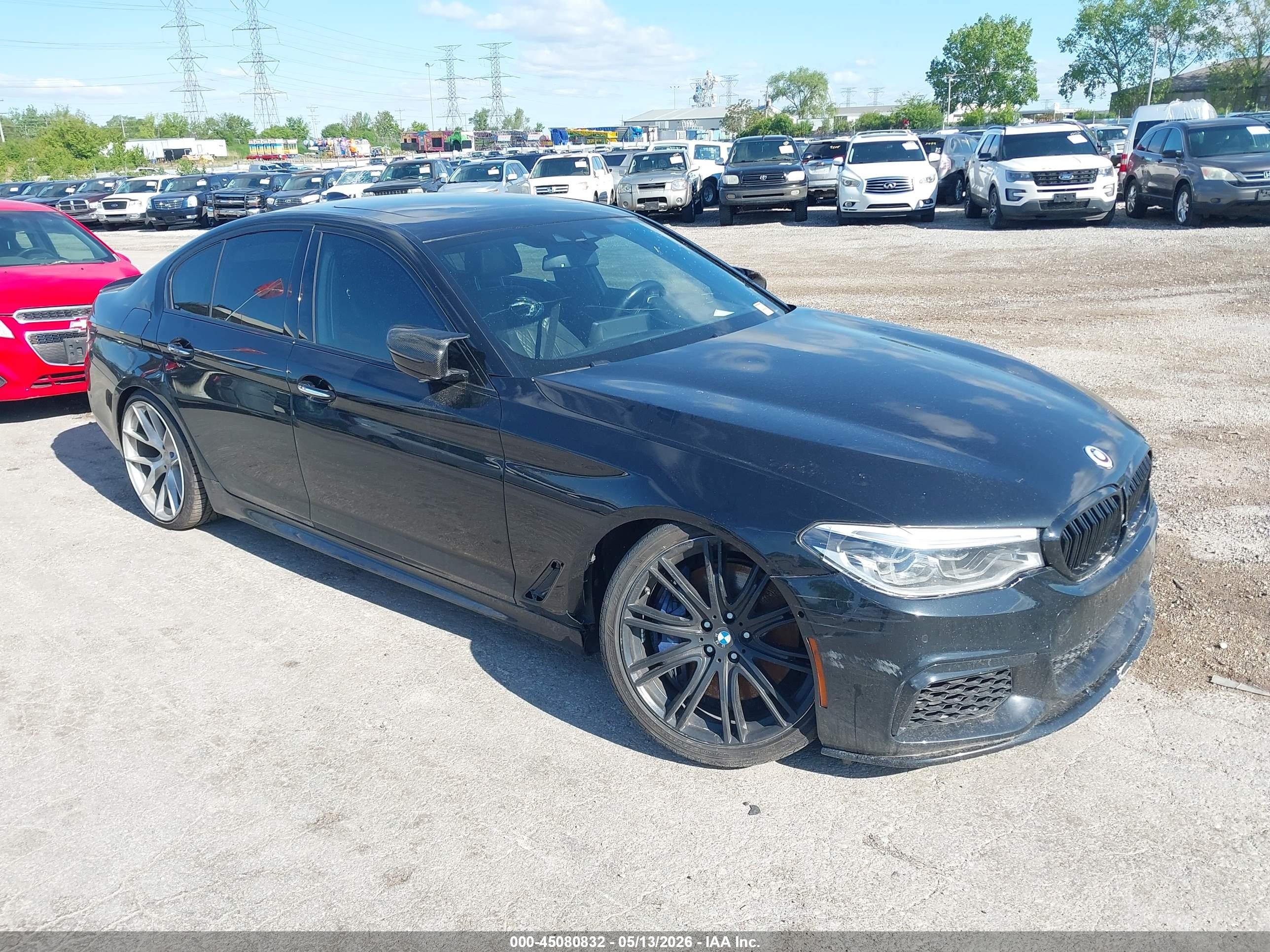 2018 BMW 5 Series M550i xDrive, VIN WBAJB9C57JB035096 — Repossession