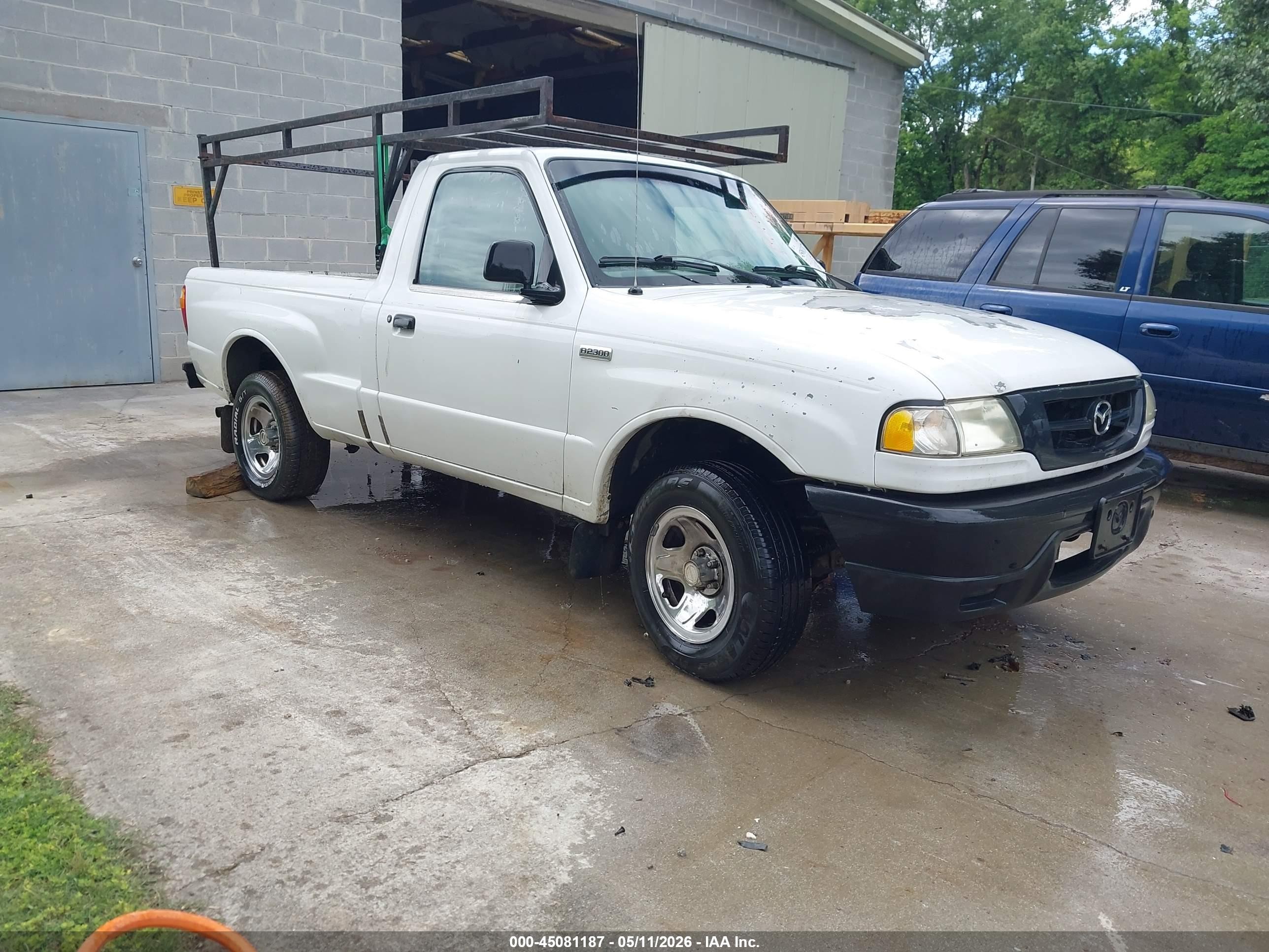 2002 Mazda B-Series SX, VIN 4F4YR12D32TM01064 — Обычный износ