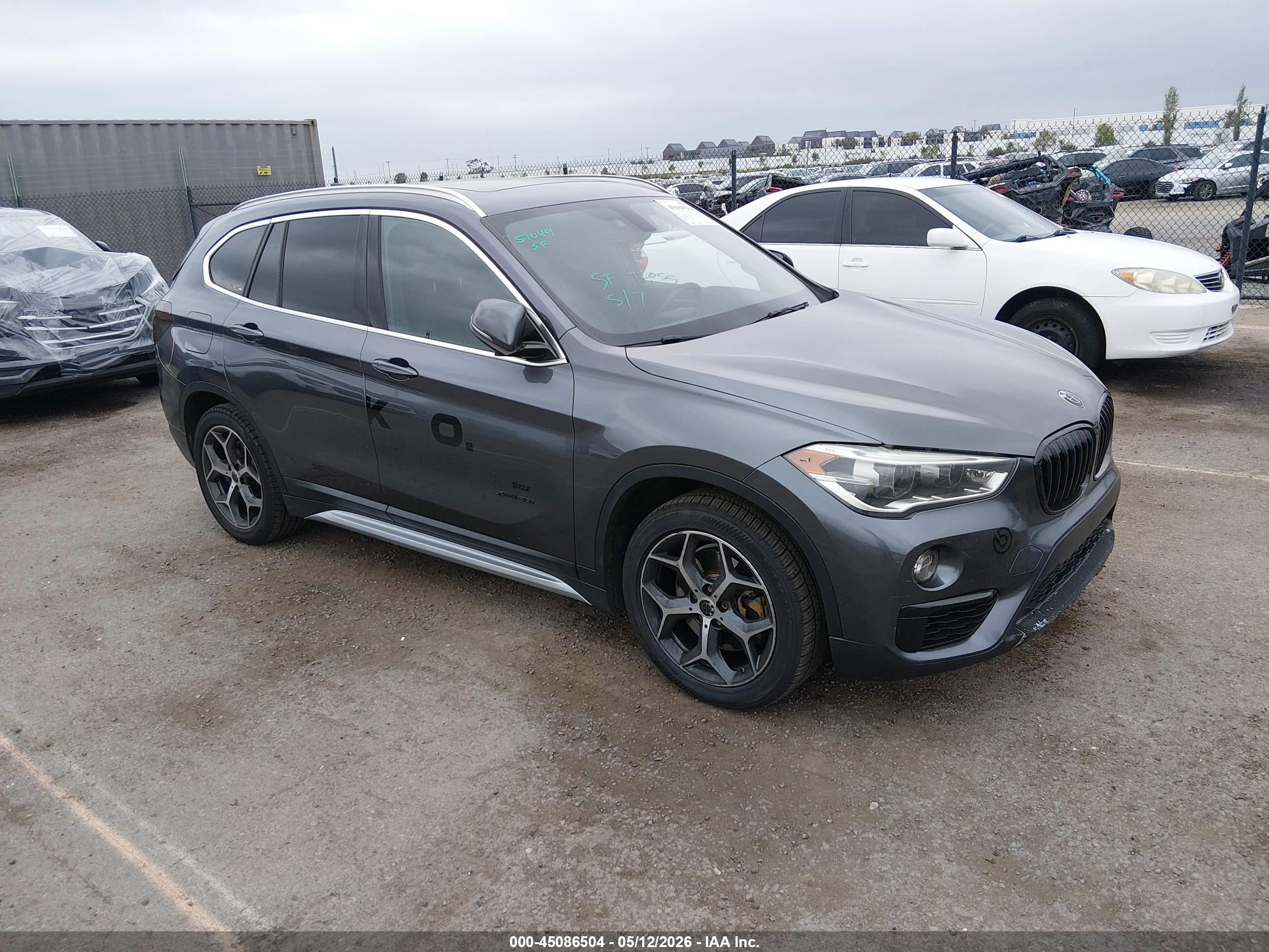 2017 BMW X1 xDrive28i, VIN WBXHT3Z38H4A53984 — Зад