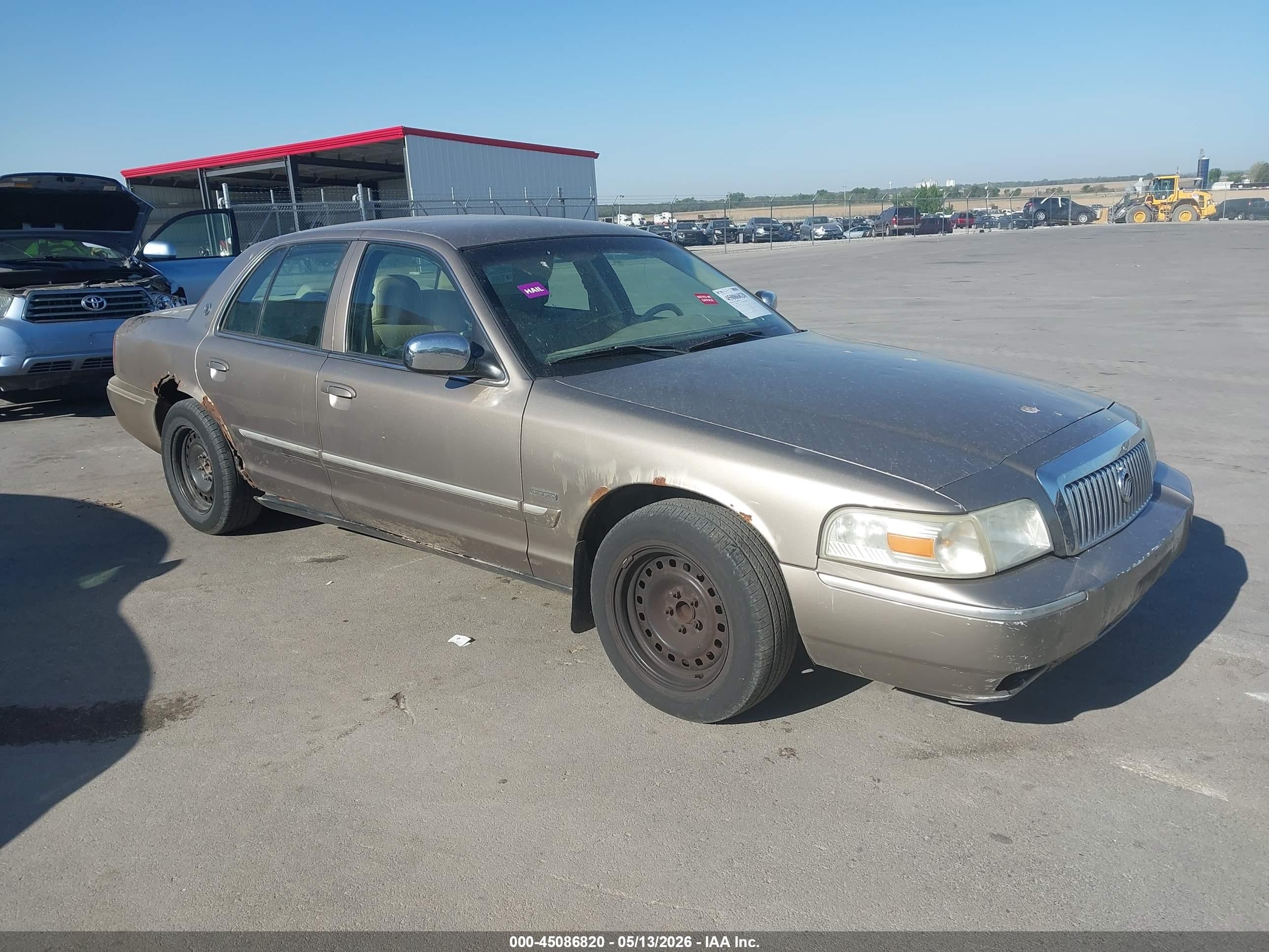 2006 Mercury Grand Marquis LS Premium, VIN 2MEHM75W16X603092 — Hail