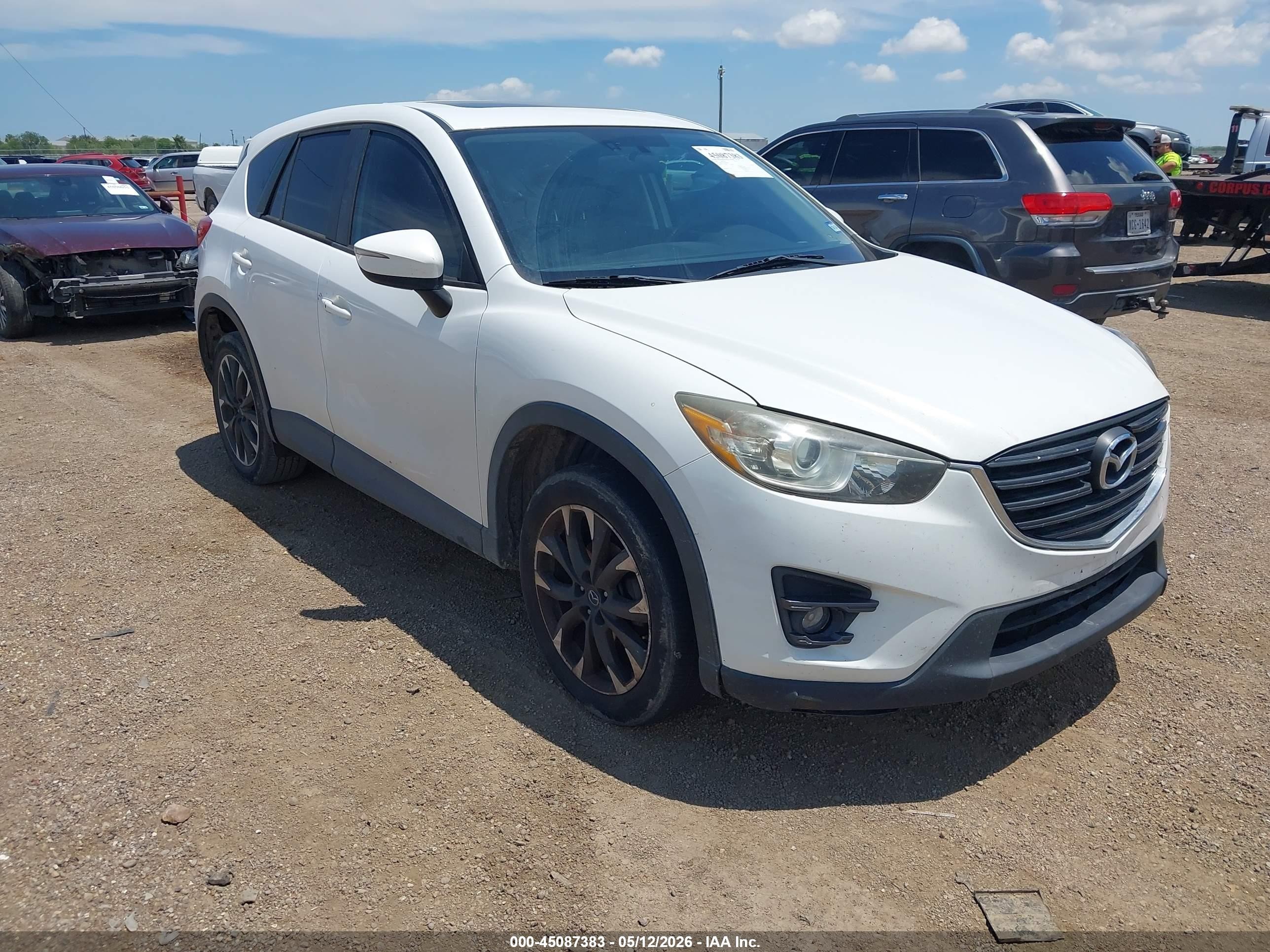 2016 Mazda CX-5 Grand Touring, VIN JM3KE2DY5G0888168 — Repossession