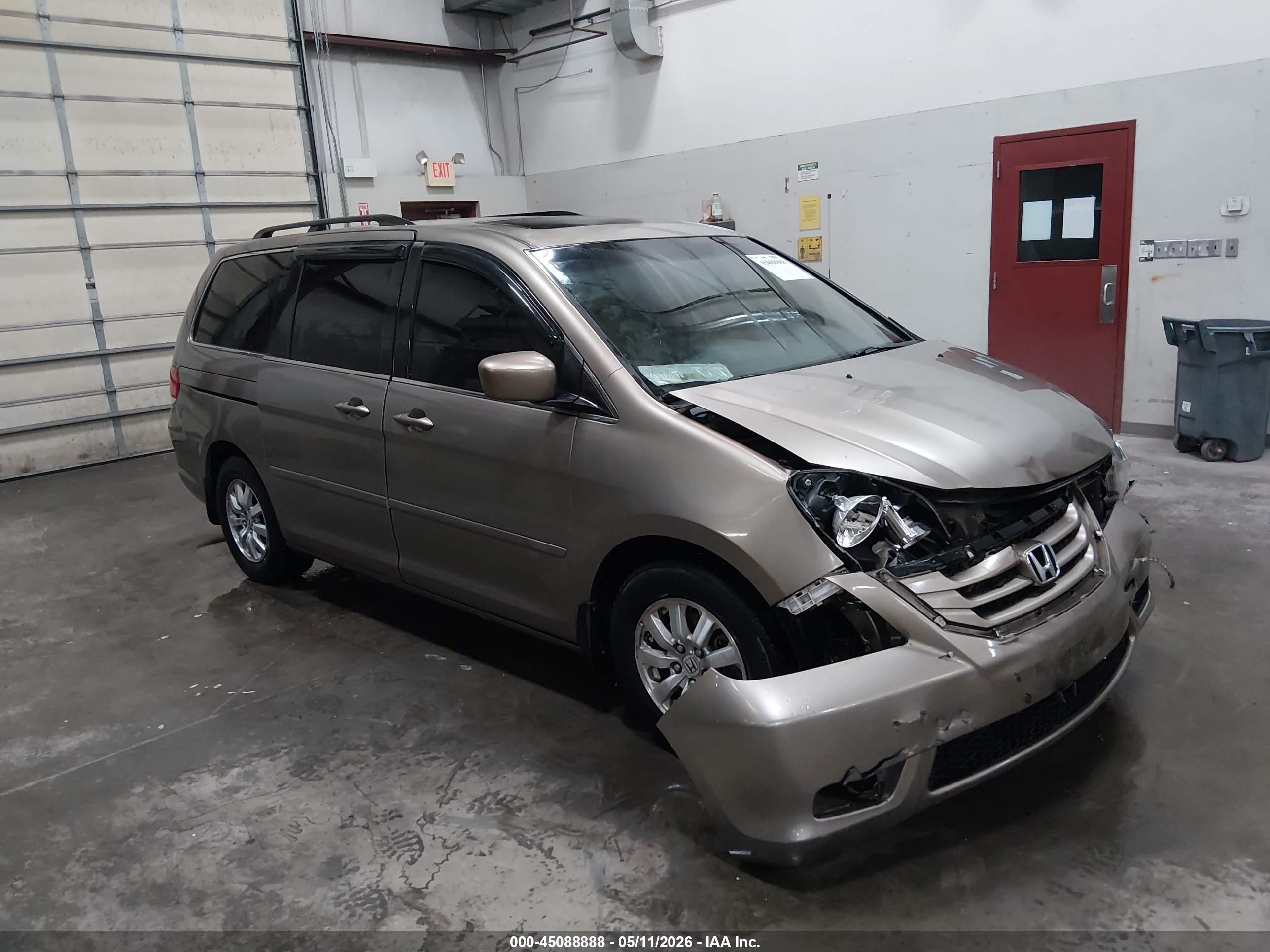 2009 Honda Odyssey EX-L, VIN 5FNRL387X9B407243 — Front end