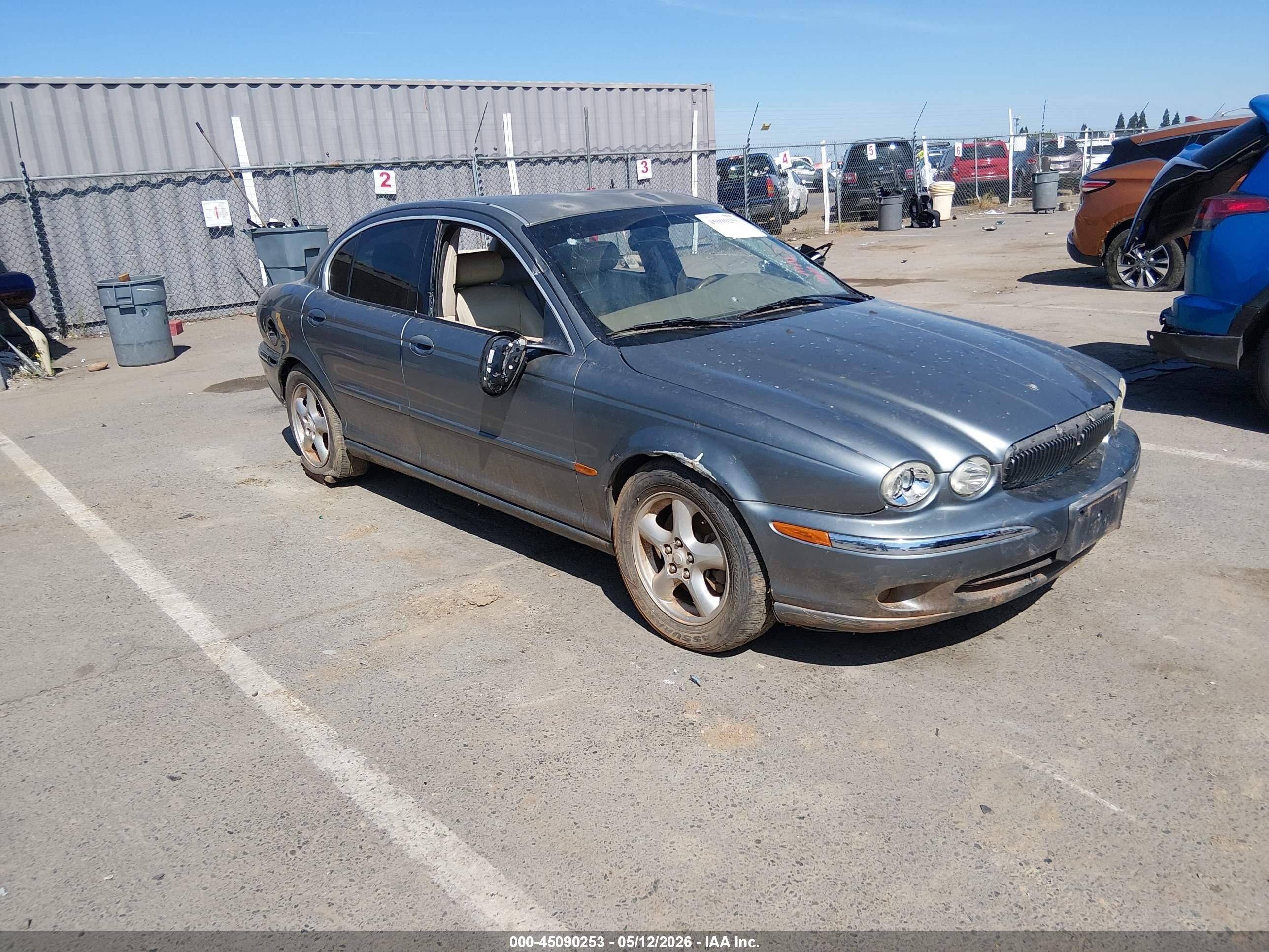 2003 Jaguar X-Type 2.5L Manual, VIN SAJEA51D33XC98349 — Rear end