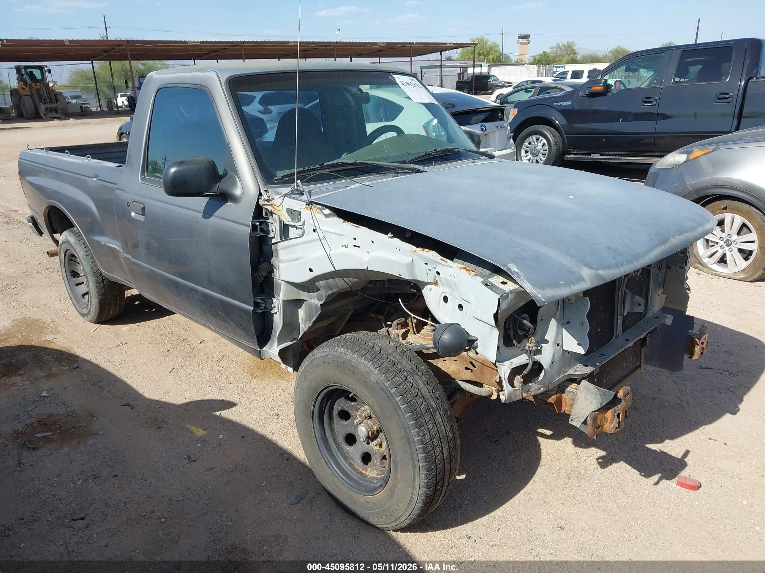 1999 Mazda B-Series SX, VIN 4F4YR12C9XTM24153 — Normal wear