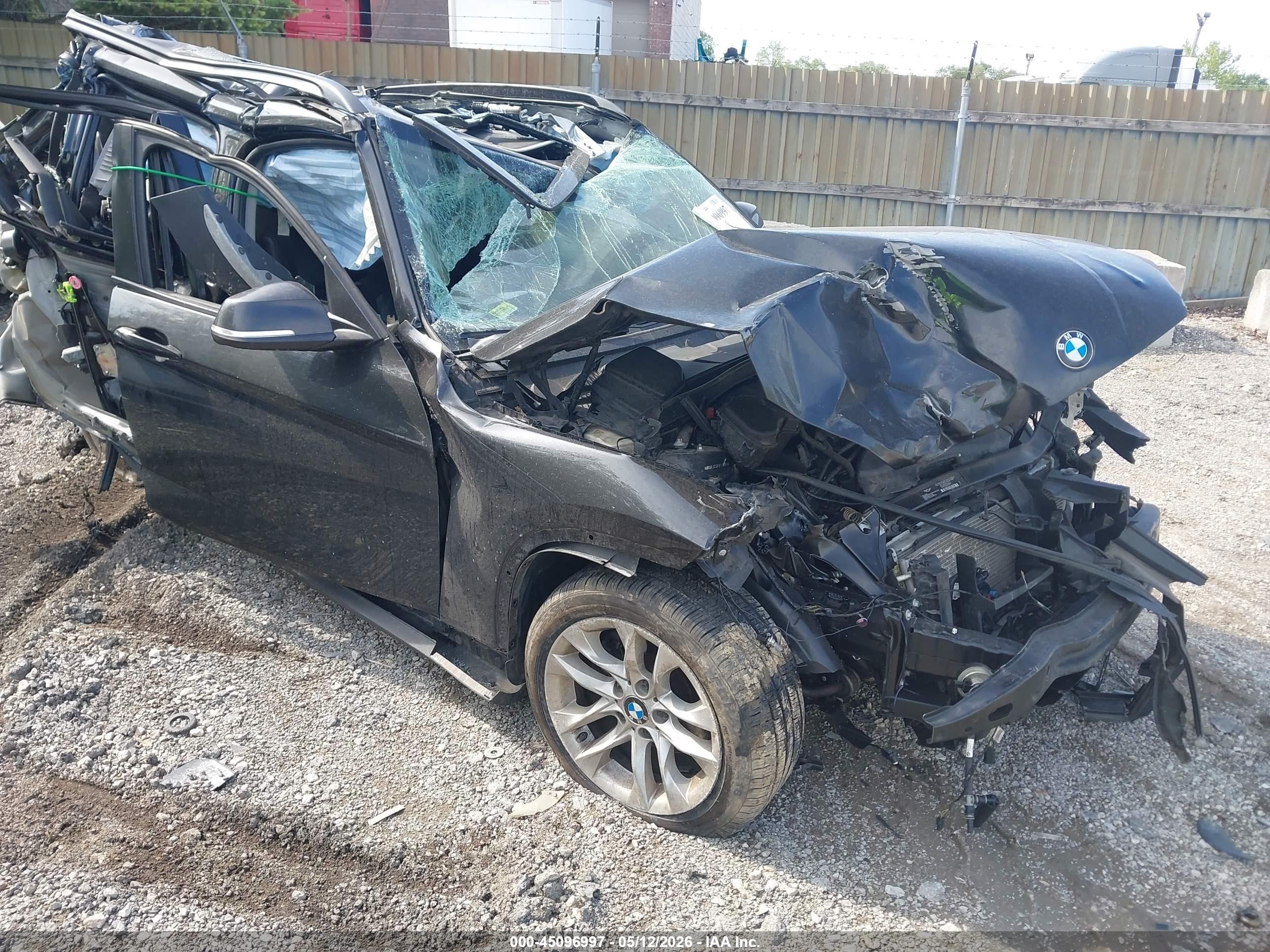 2015 BMW X1 xDrive28i, VIN WBAVL1C52FVY31860 — Rollover