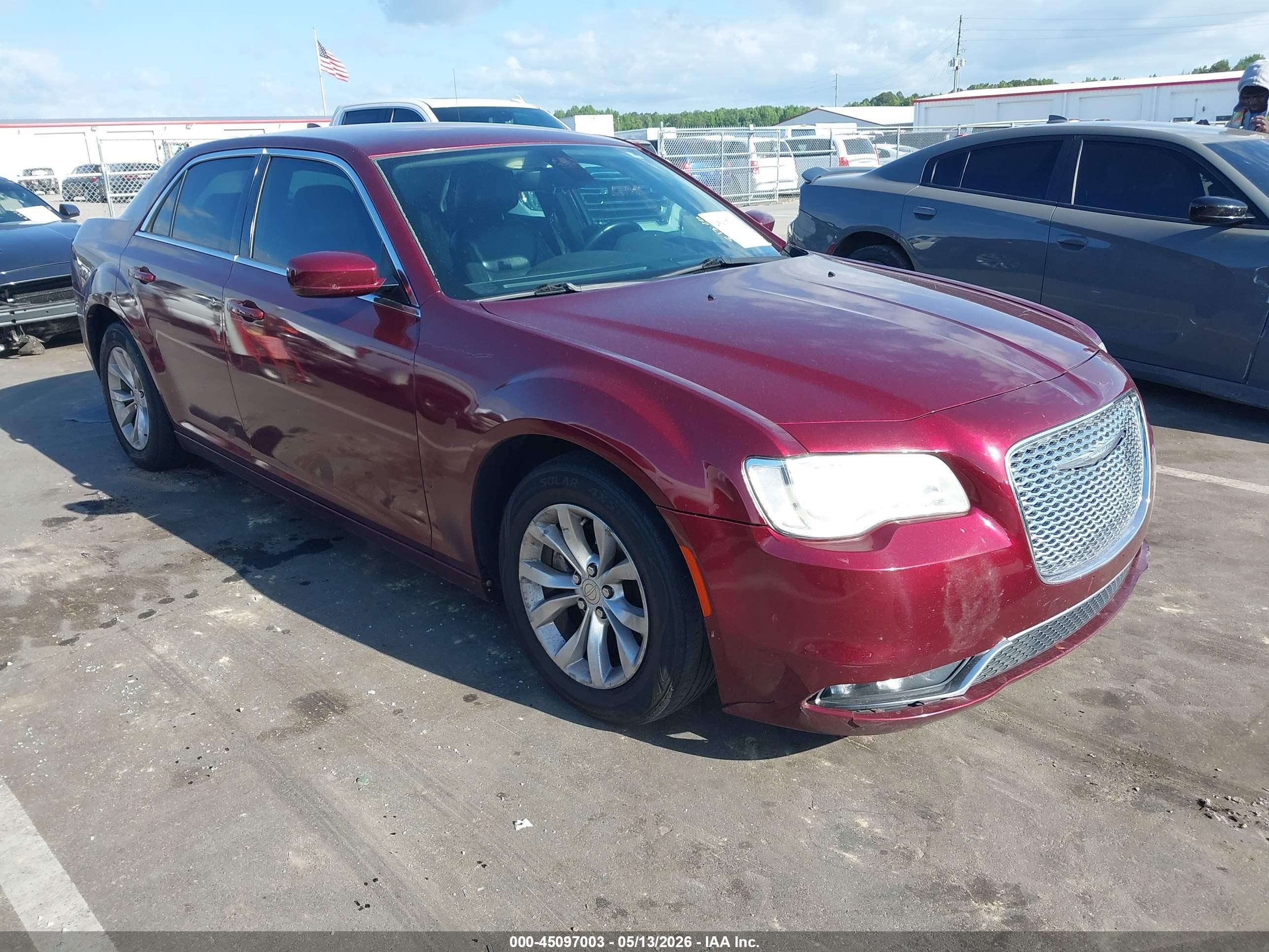 2015 Chrysler 300 Limited, VIN 2C3CCAAG2FH830154 — Side