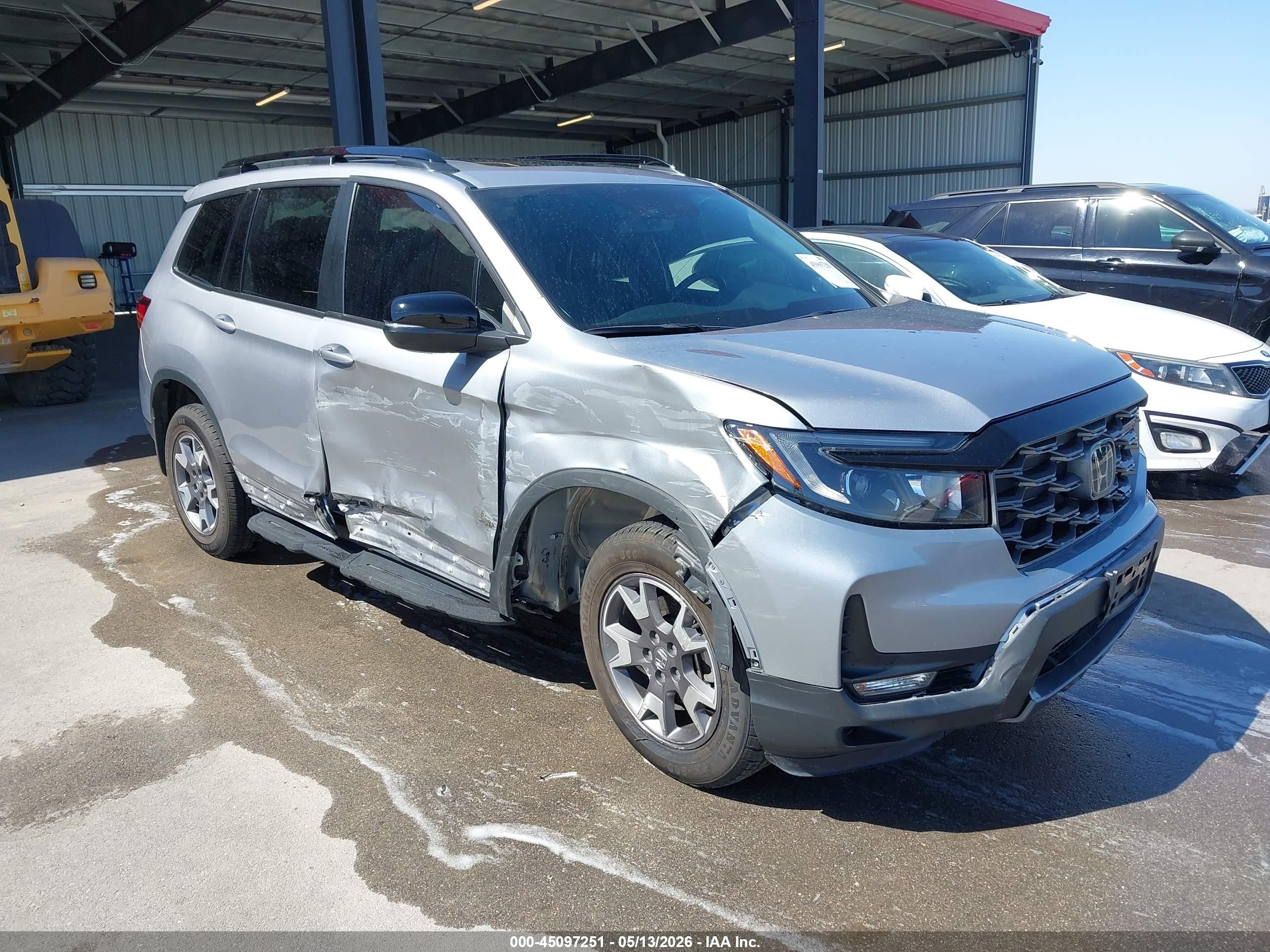 2022 Honda Passport TrailSport, VIN 5FNYF8H60NB012540 — Side