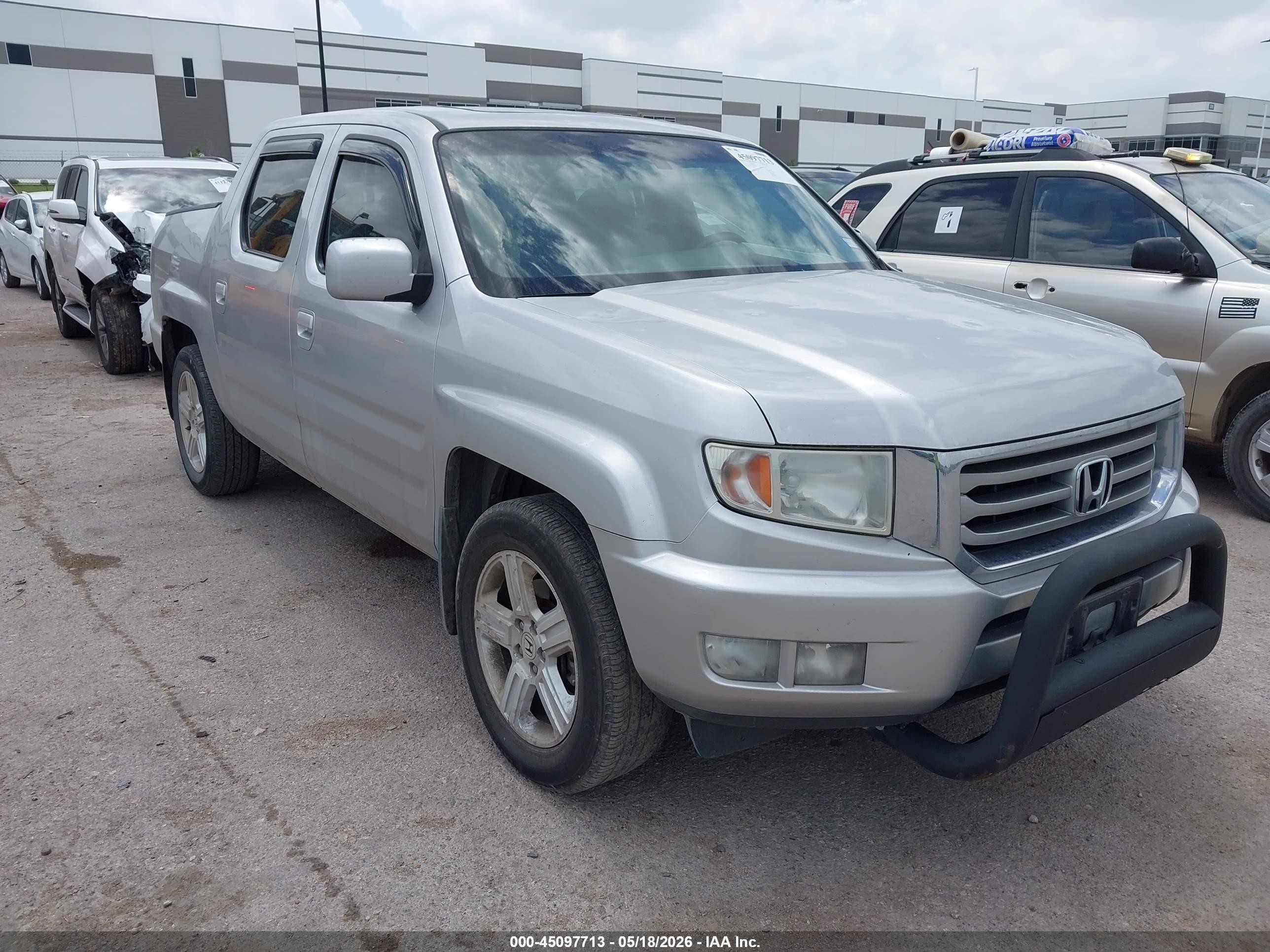 2012 Honda Ridgeline RTL, VIN 5FPYK1F5XCB460379 — Hail